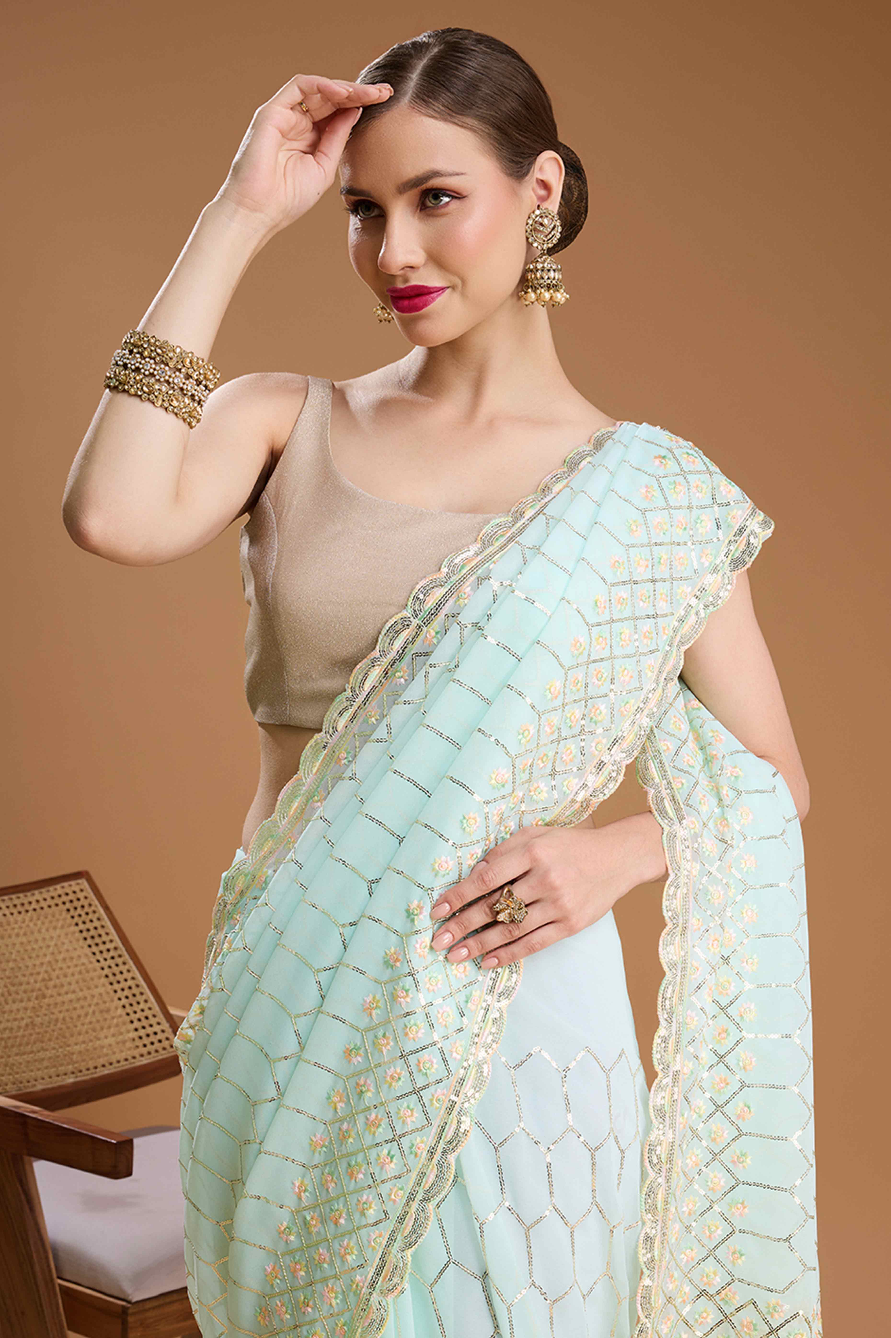 Mint Green Georgette Saree Enhanced with Elegant Sequins Embellishments