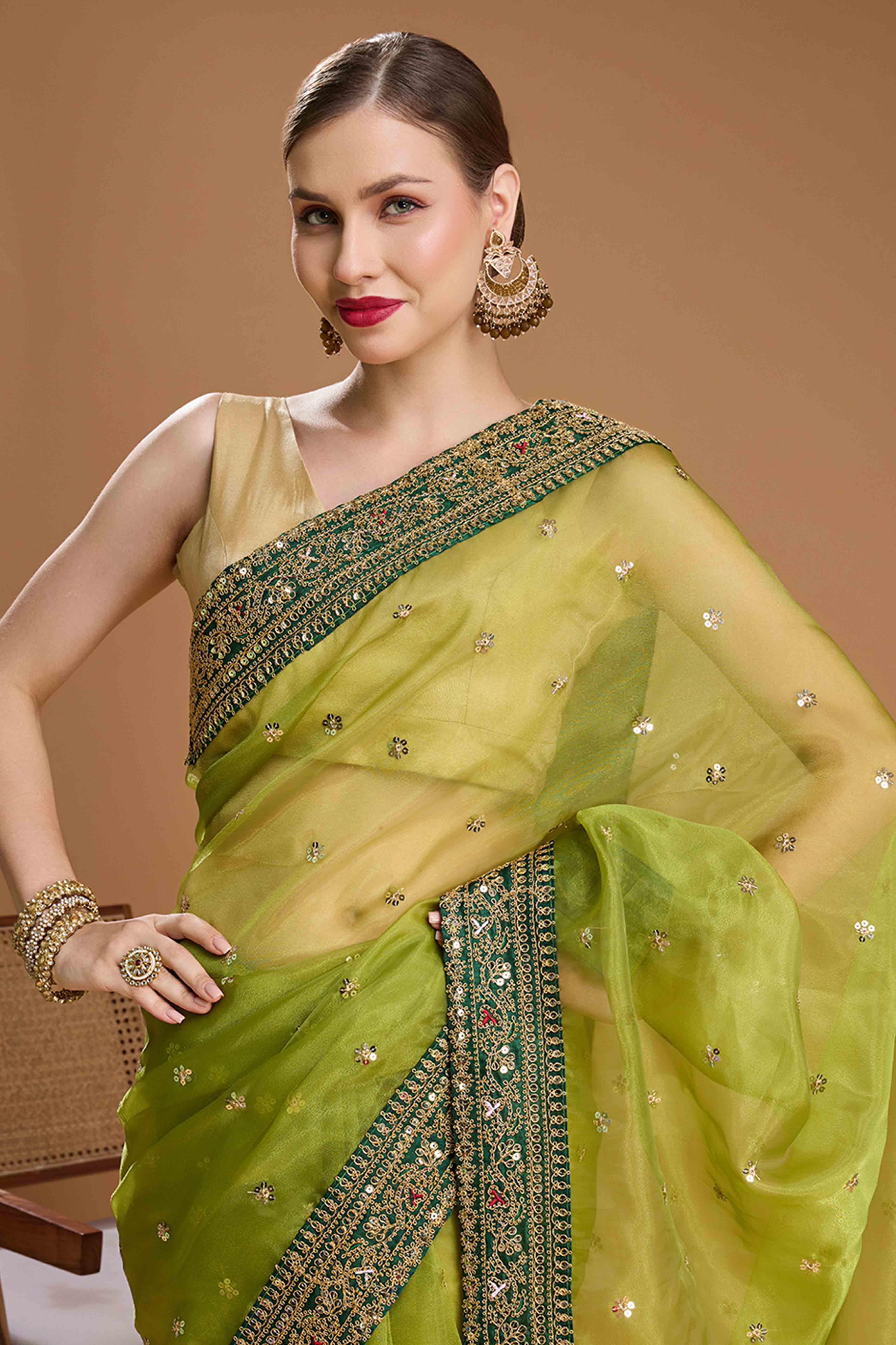 Green Organza Saree Enhanced with Elegant Sequins Embellishments