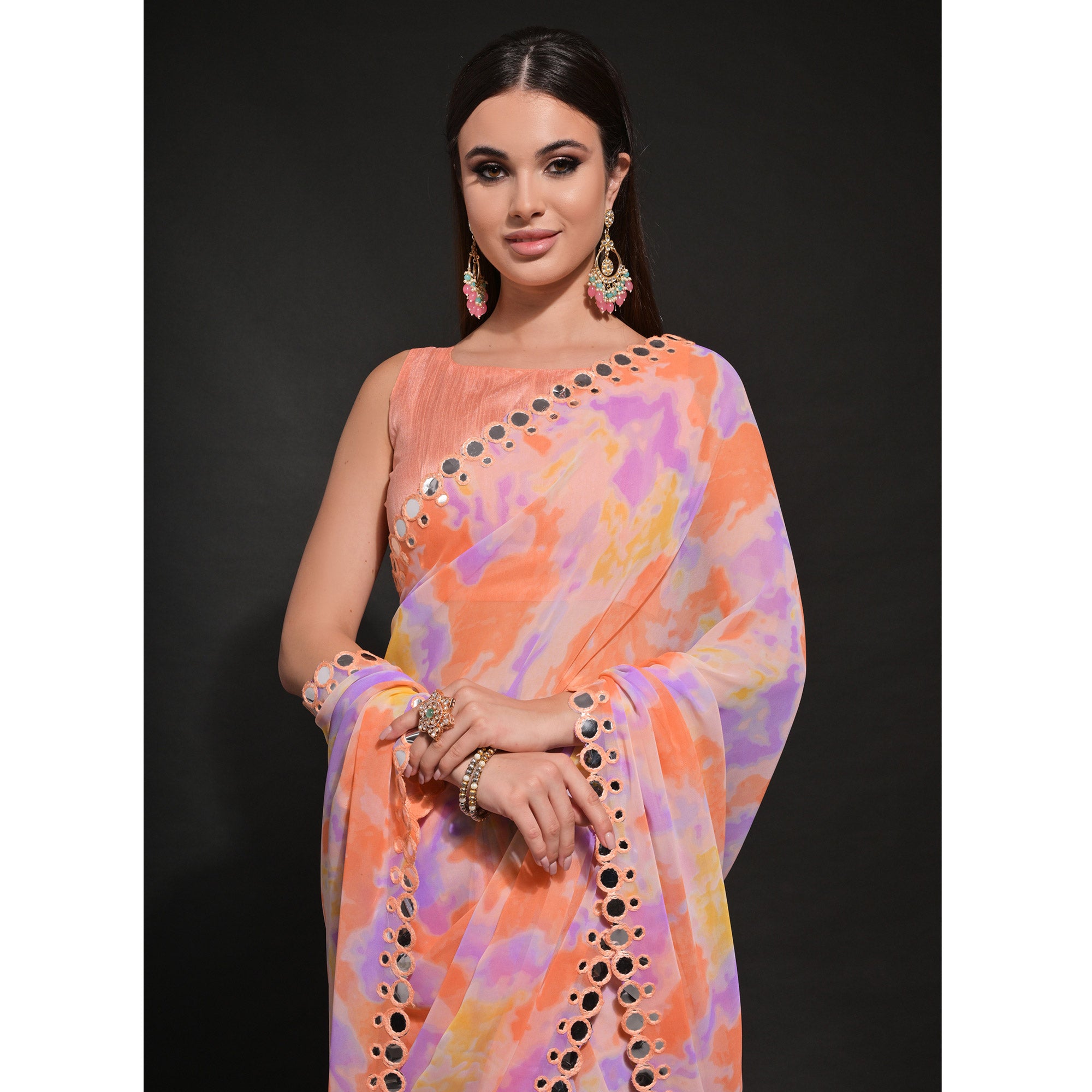 Peach Printed Georgette Saree With Embroidered Lace
