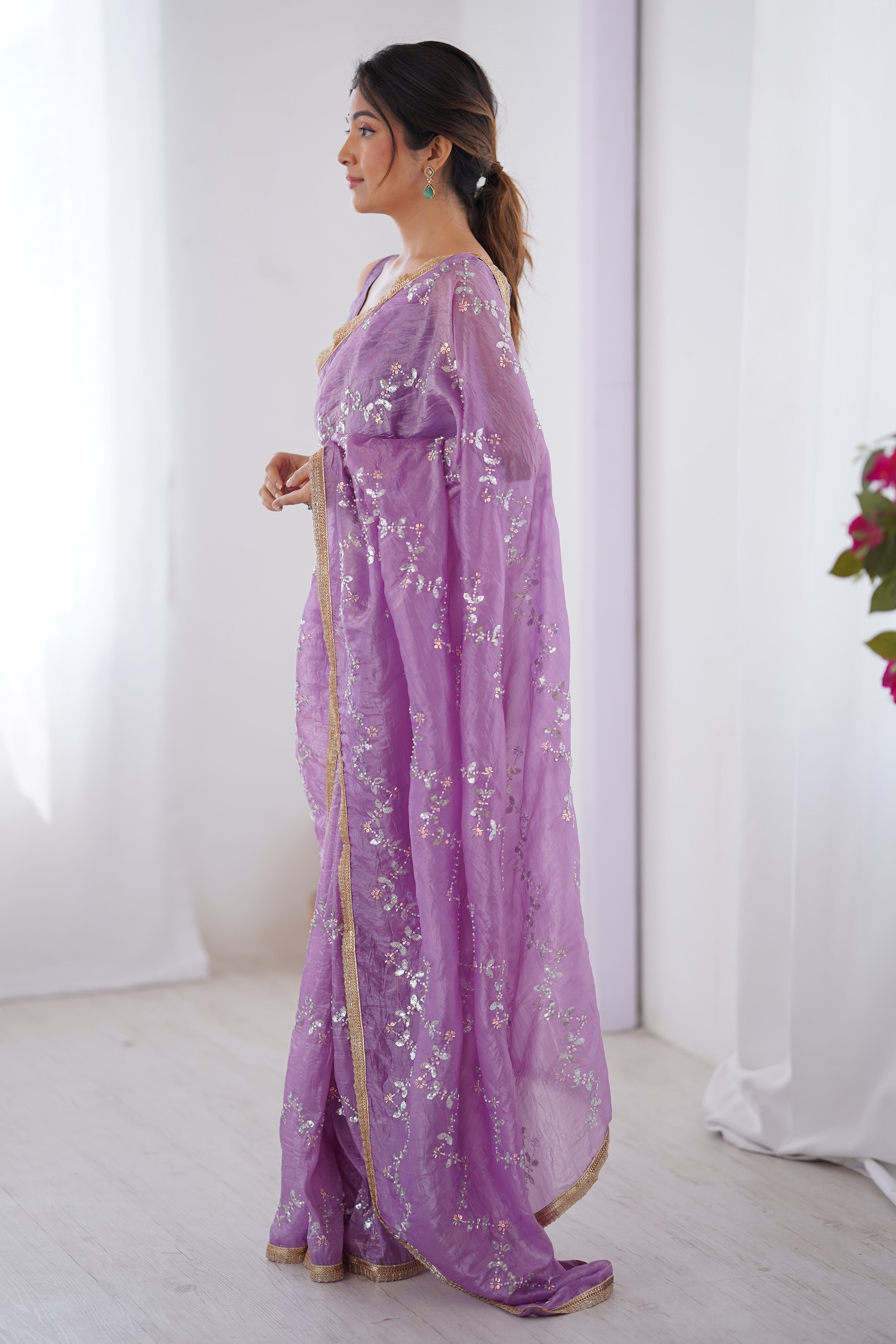 Dazzling Lavender Organza Saree Accented with Sequin, Bead & Stone Work and Delicate Lace Detailing