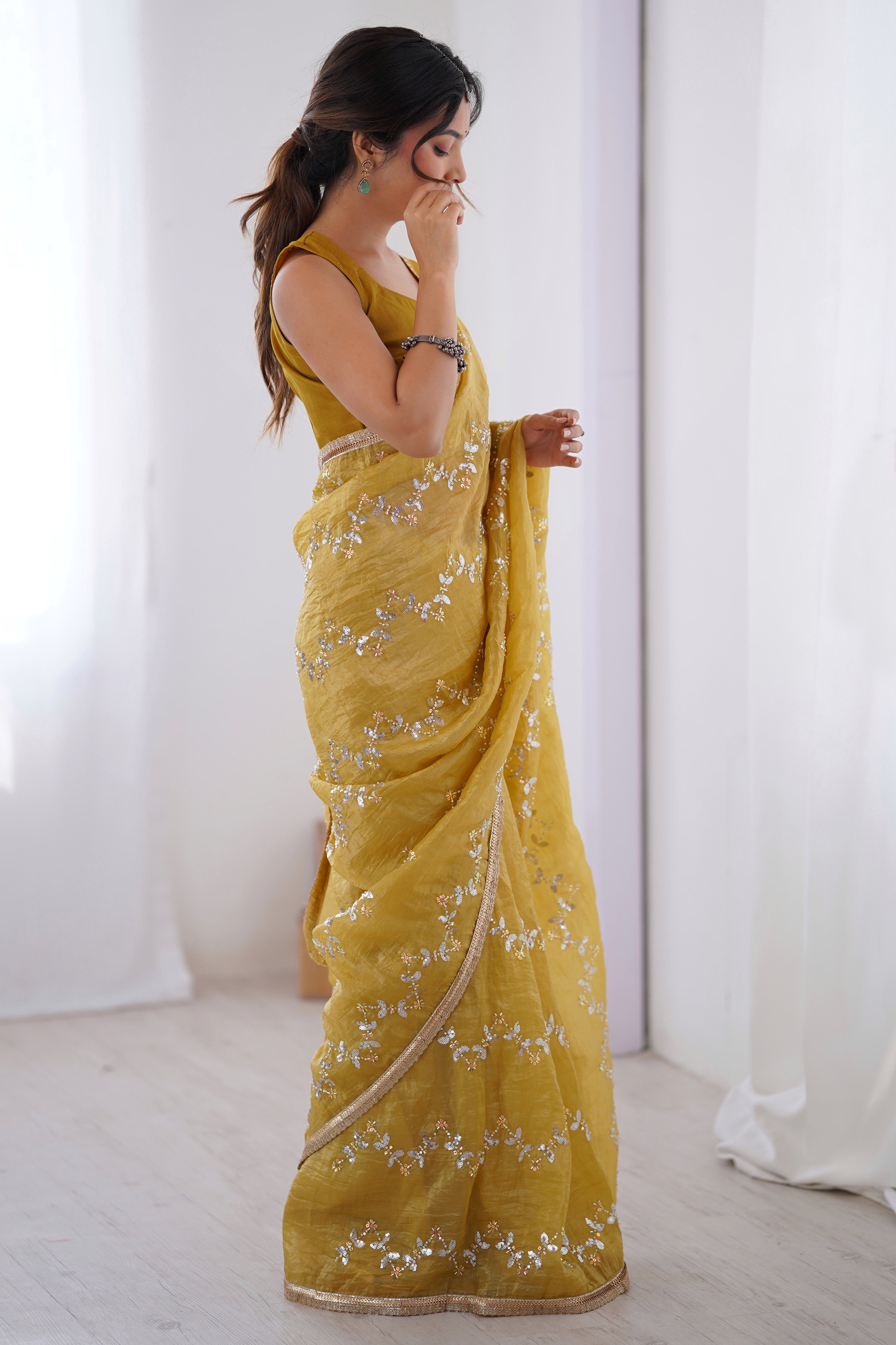Dazzling Mustard Yellow Organza Saree Accented with Sequin, Bead & Stone Work and Delicate Lace Detailing