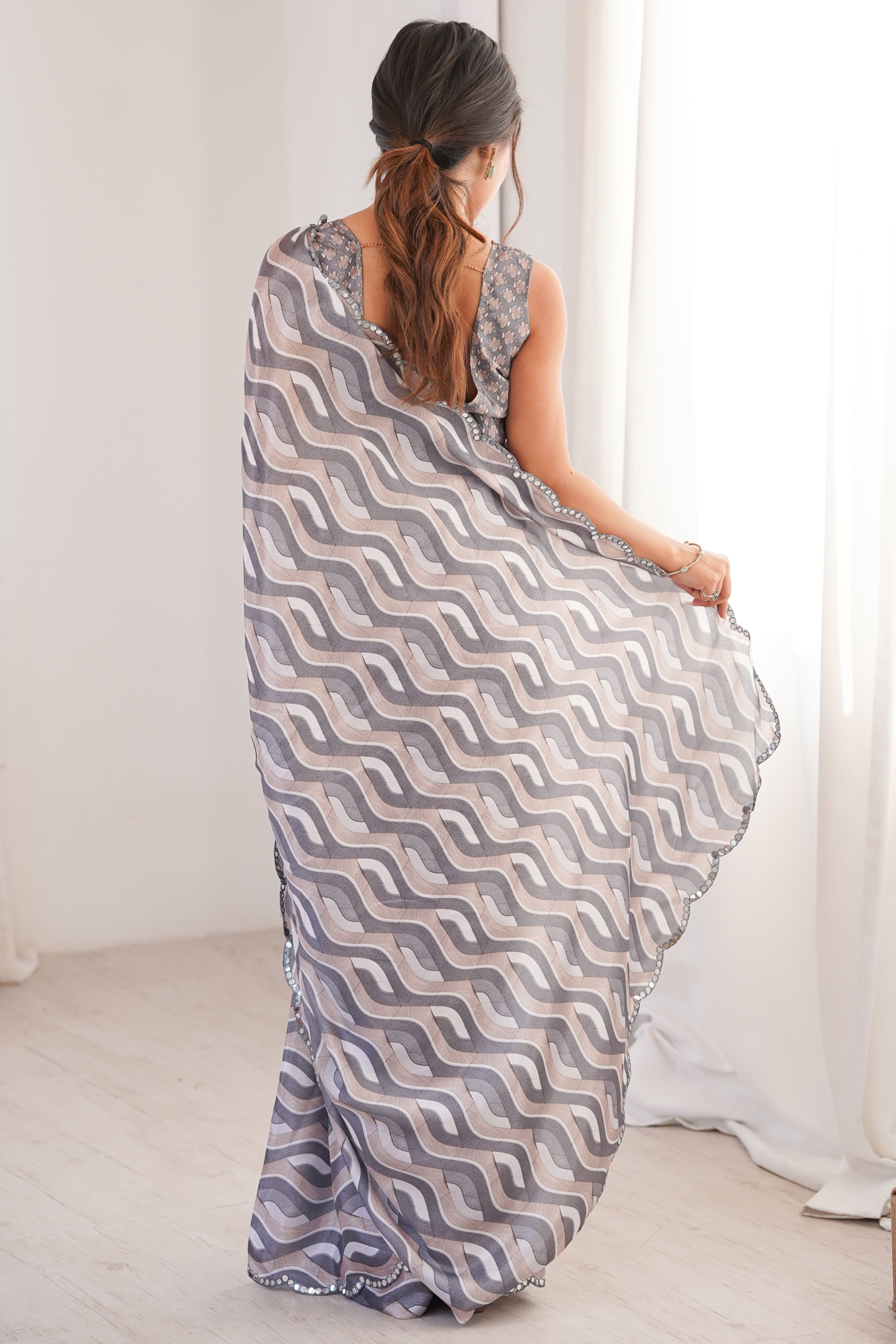 Elegant Grey Zig Zag Digital Printed Chinon Saree Accented With Intricate Embroidered Border