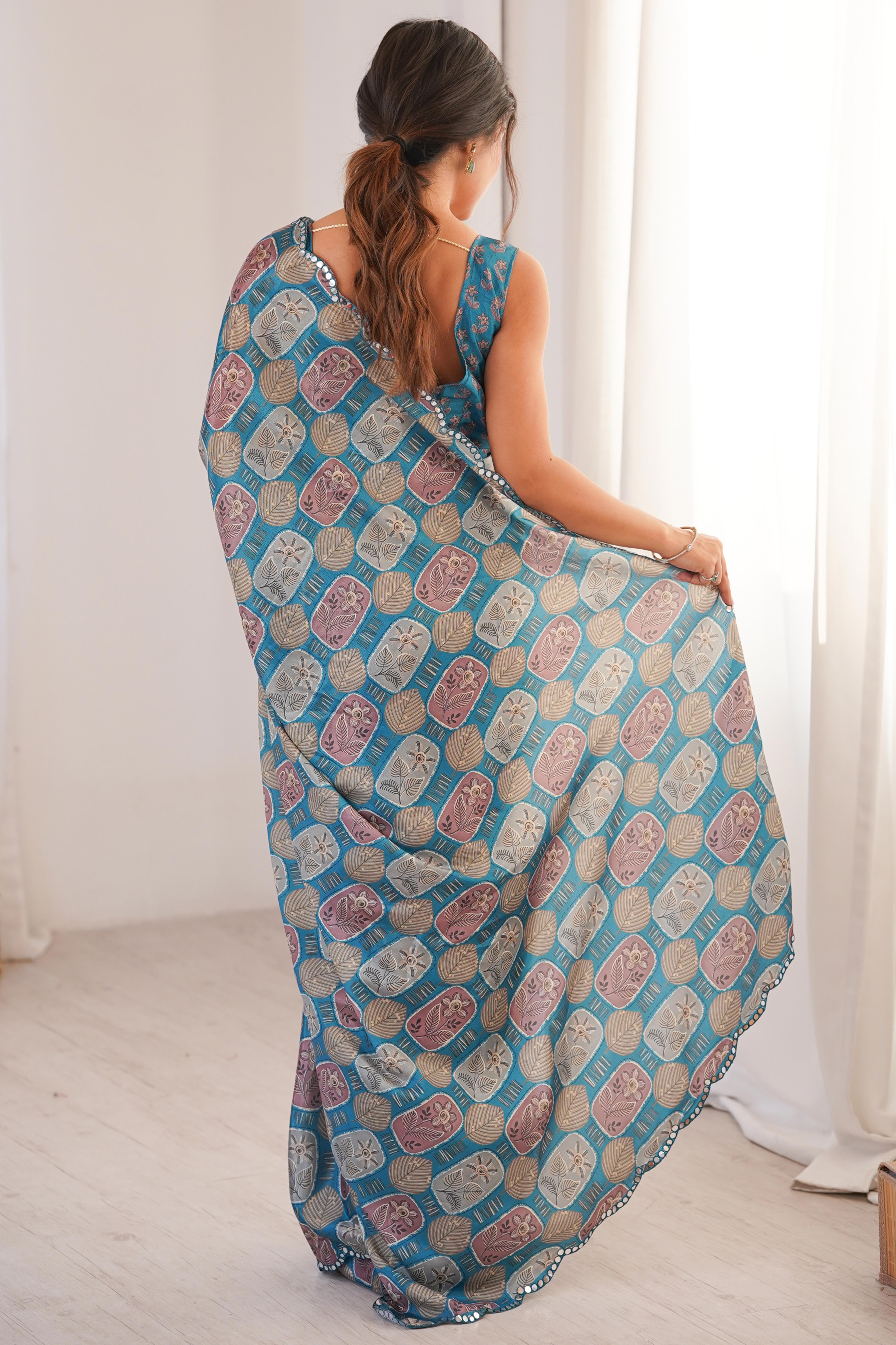 Timeless Teal Blue Floral Digital Printed Chinon Saree Enhanced With Fine Embroidered Border
