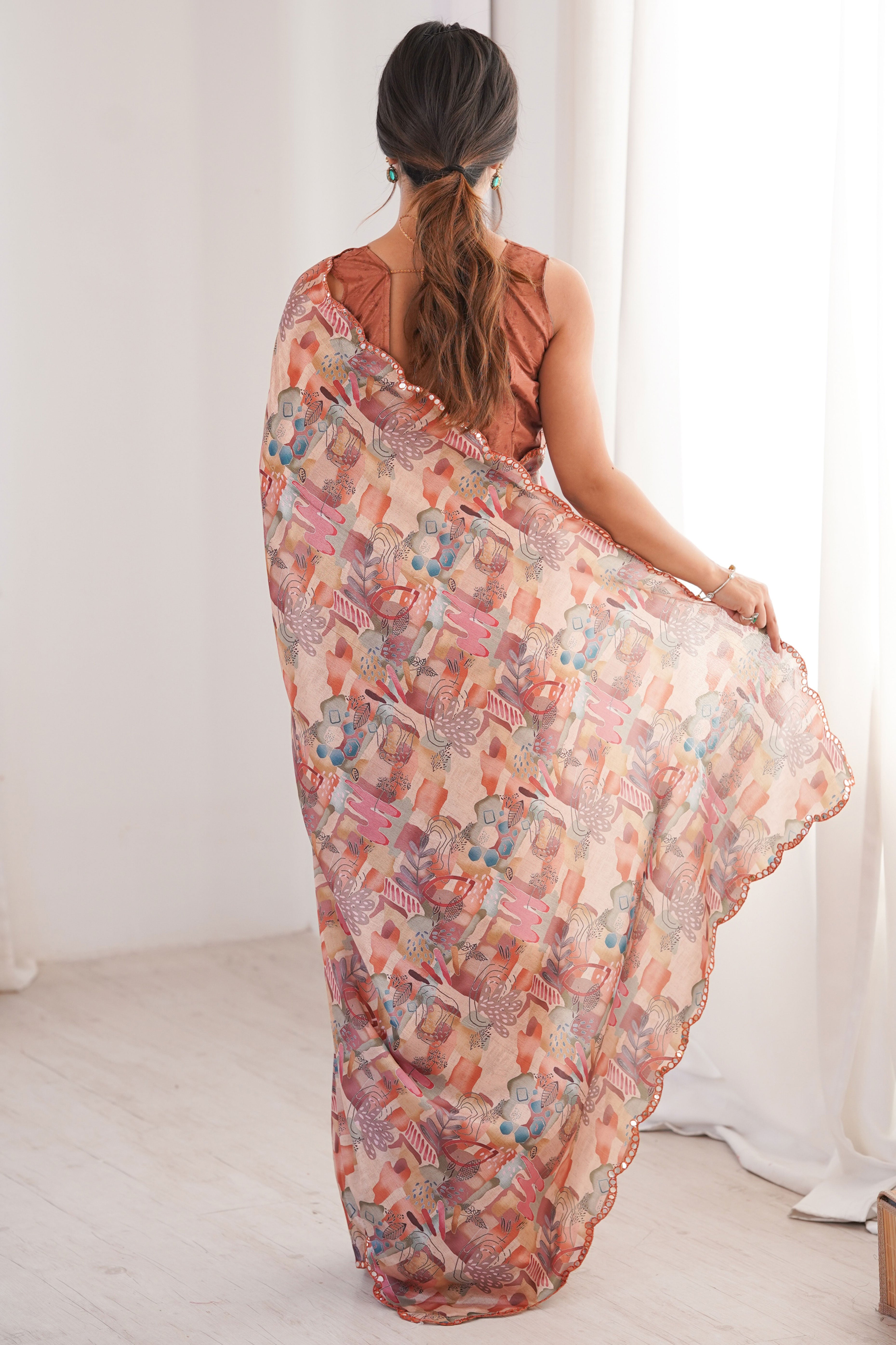 Refined Peach Digital Printed Chinon Saree Showcasing Artistic Embroidered Border Detailing