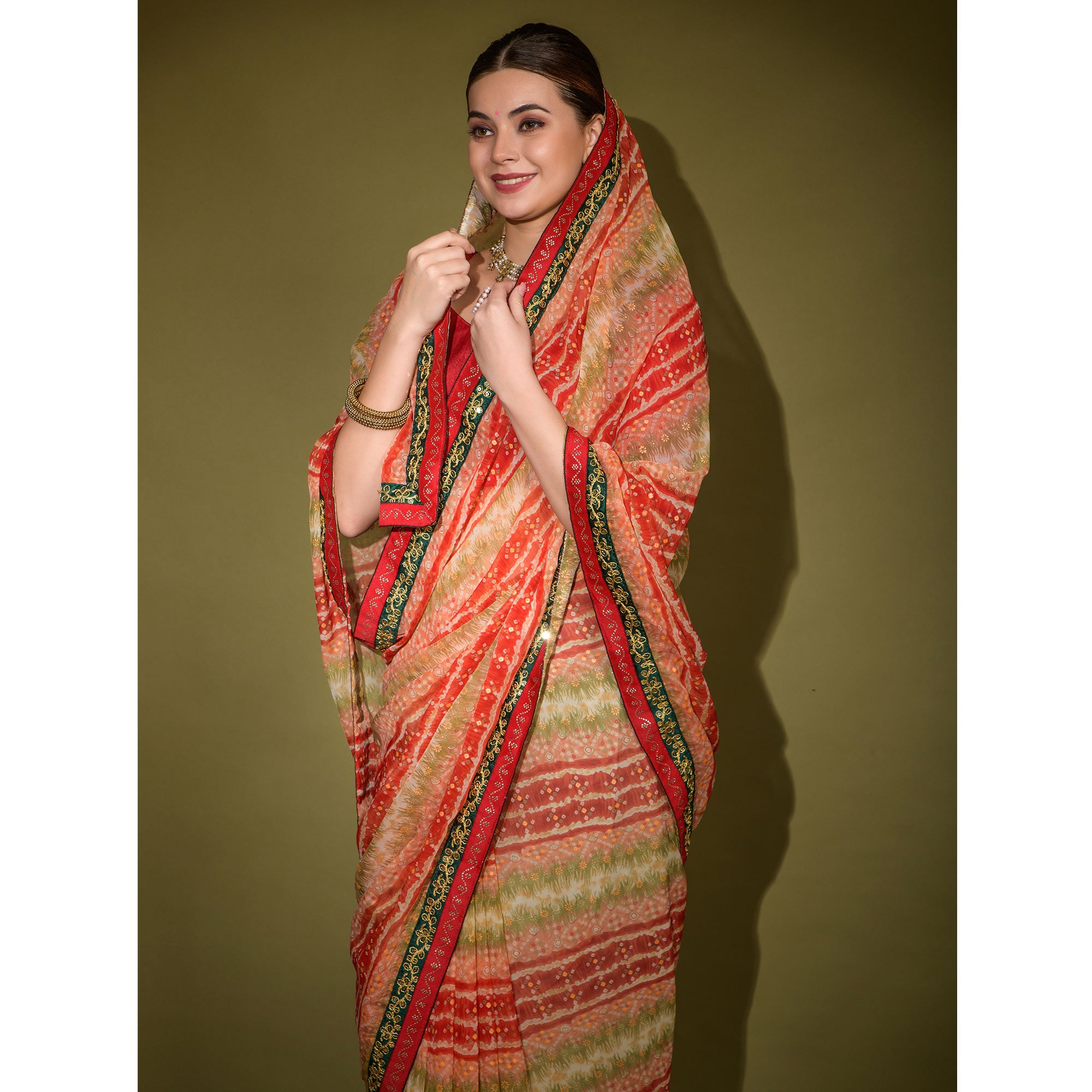Red Leheriya Printed Georgette Saree With Embroidered Border