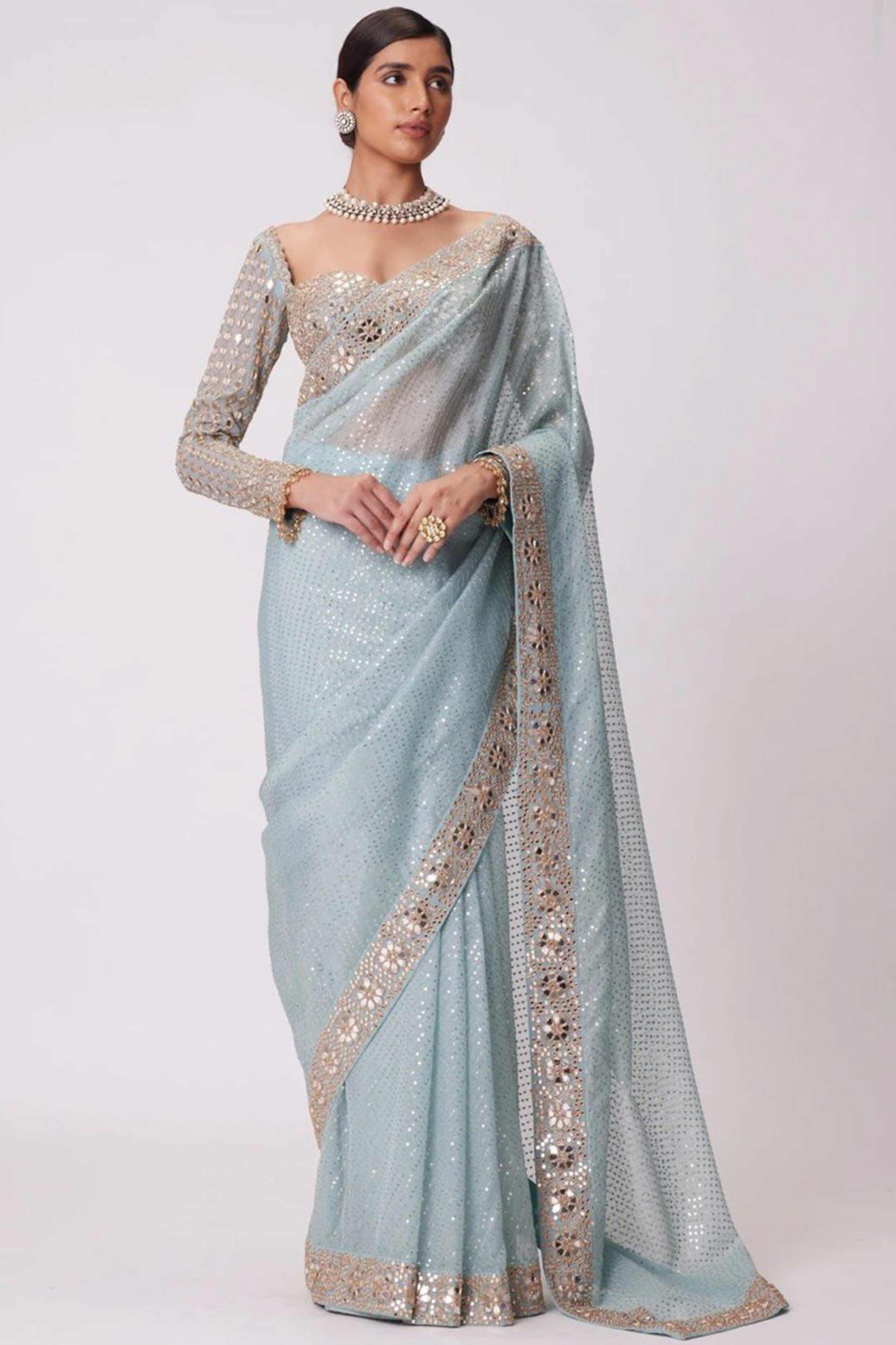 Sky Blue Faux Georgette Saree Adorned with Sequins Work and Elegant Embellishments
