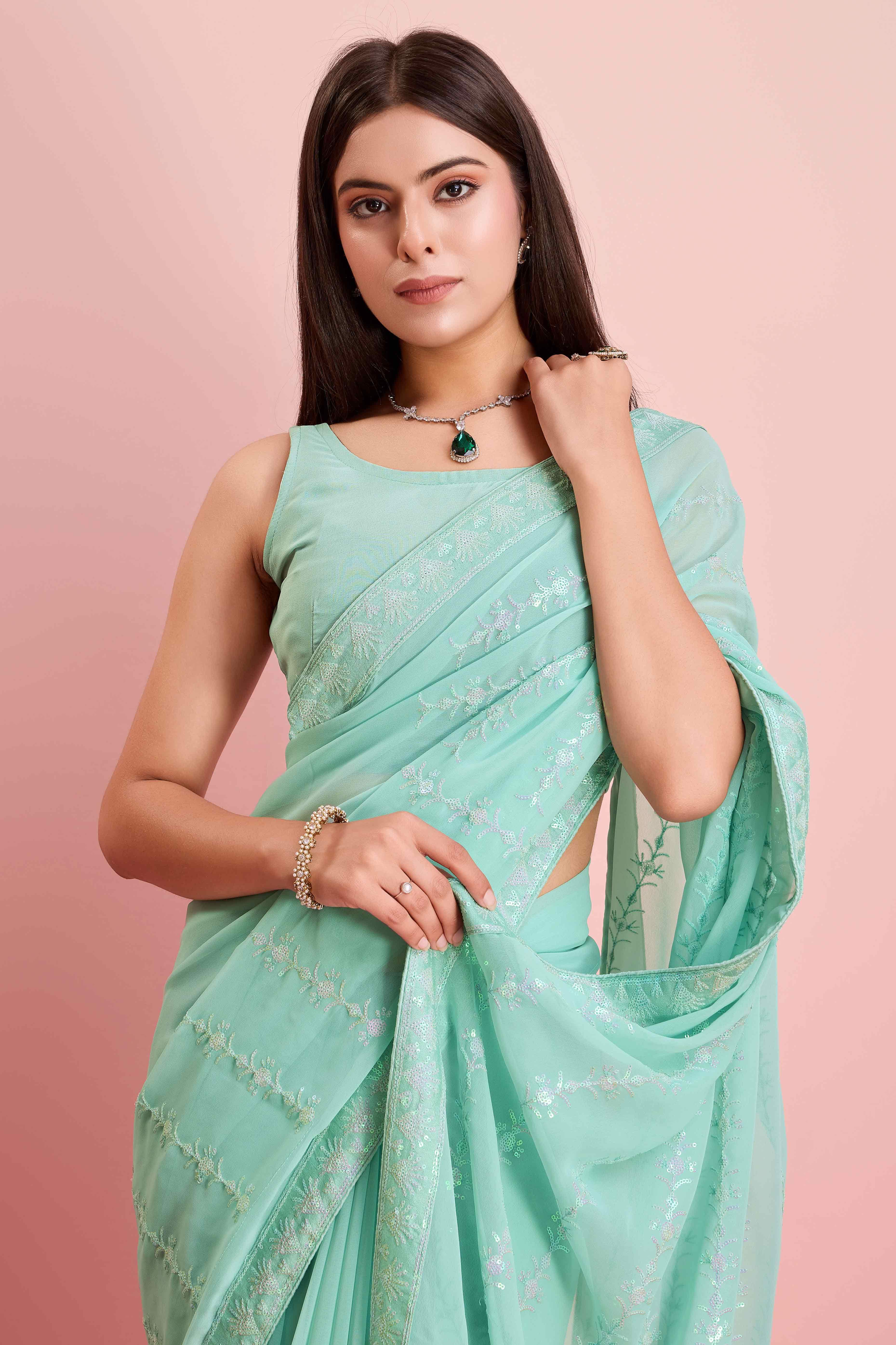 Turquoise Floral Sequins Embroidered Georgette Saree