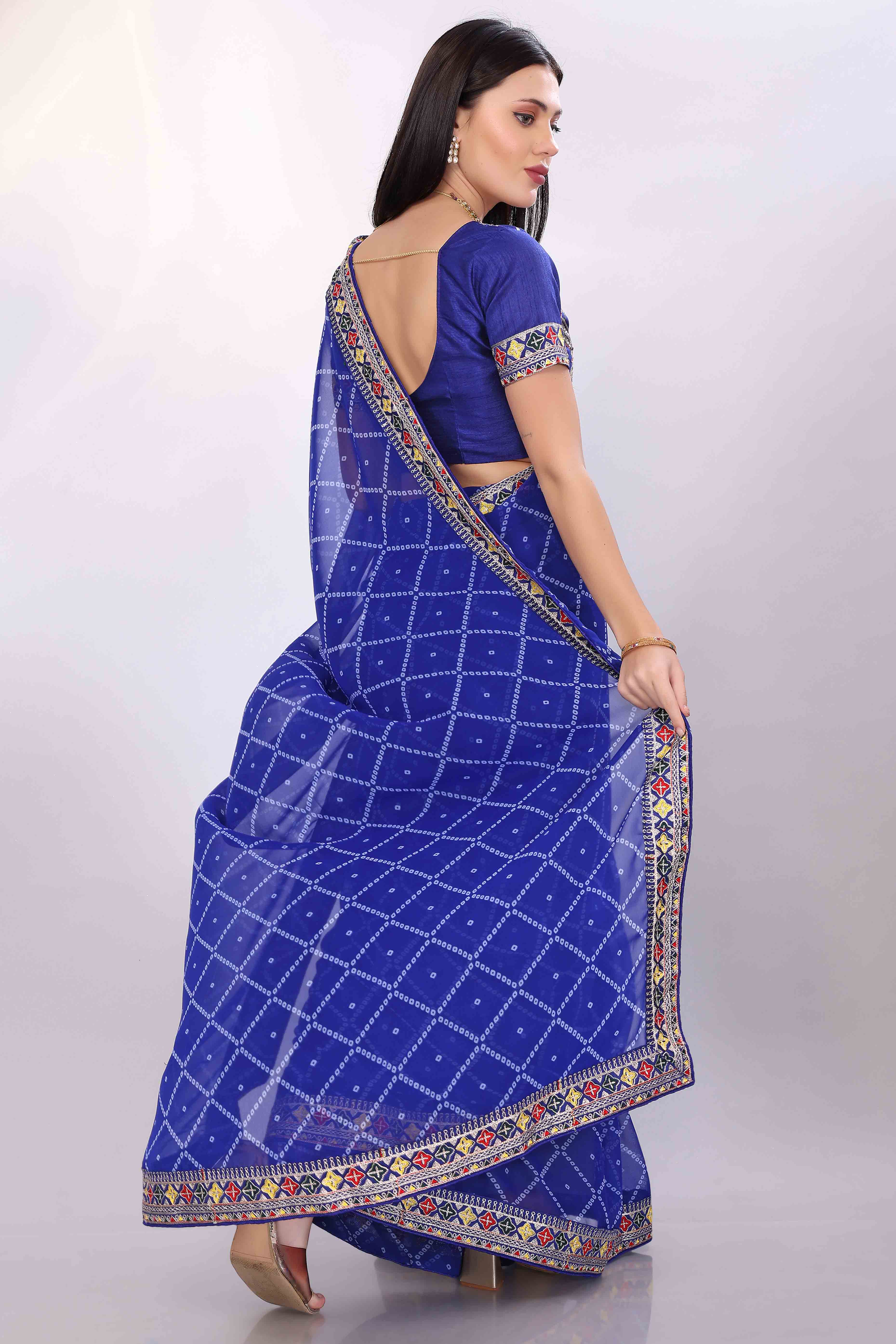 Blue Bandhani Printed Georgette Saree Framed With Elegant Embroidered Border