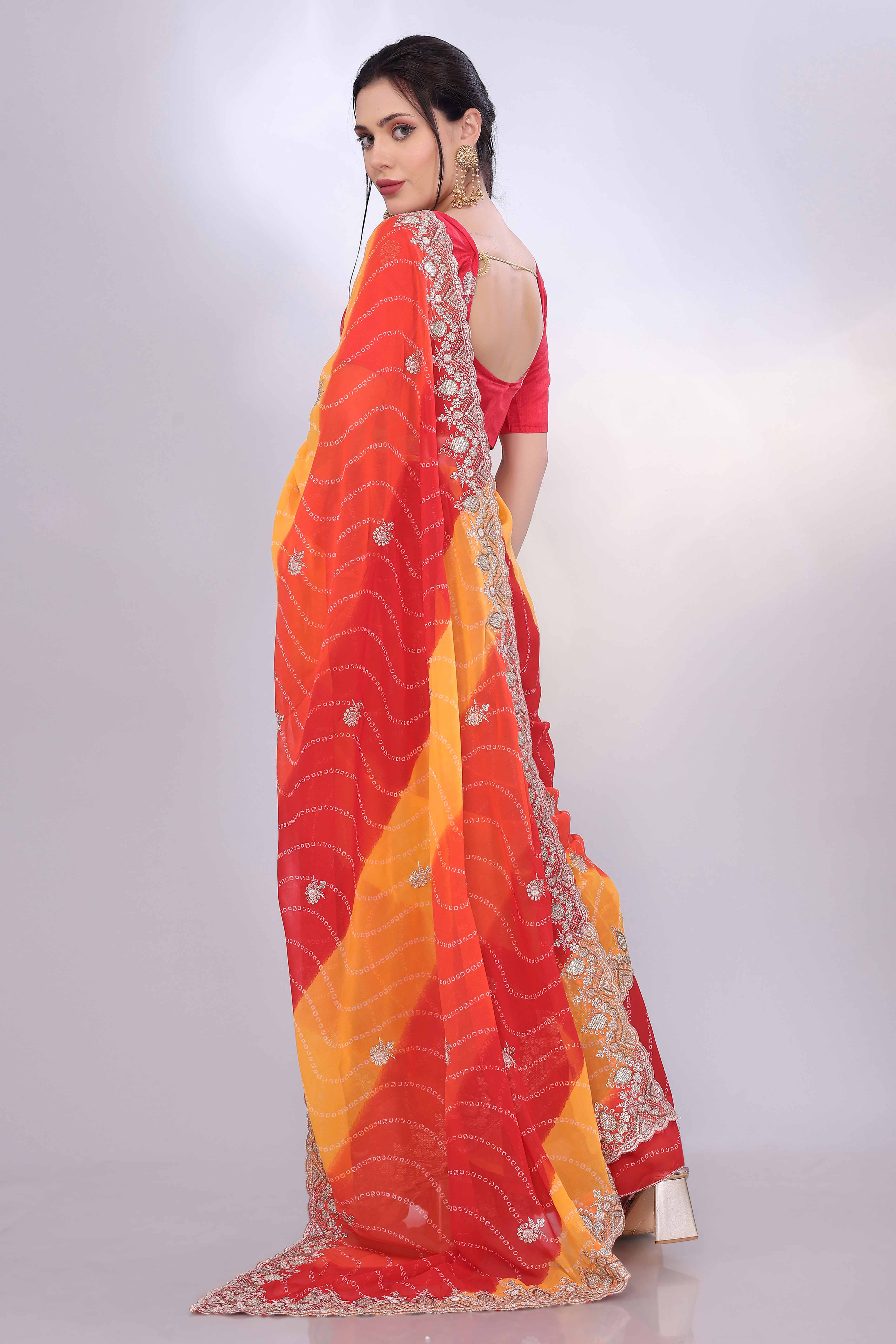 Red & Yellow Georgette Saree Showcasing Bandhani Print & Delicate Floral Sequins Embroidery