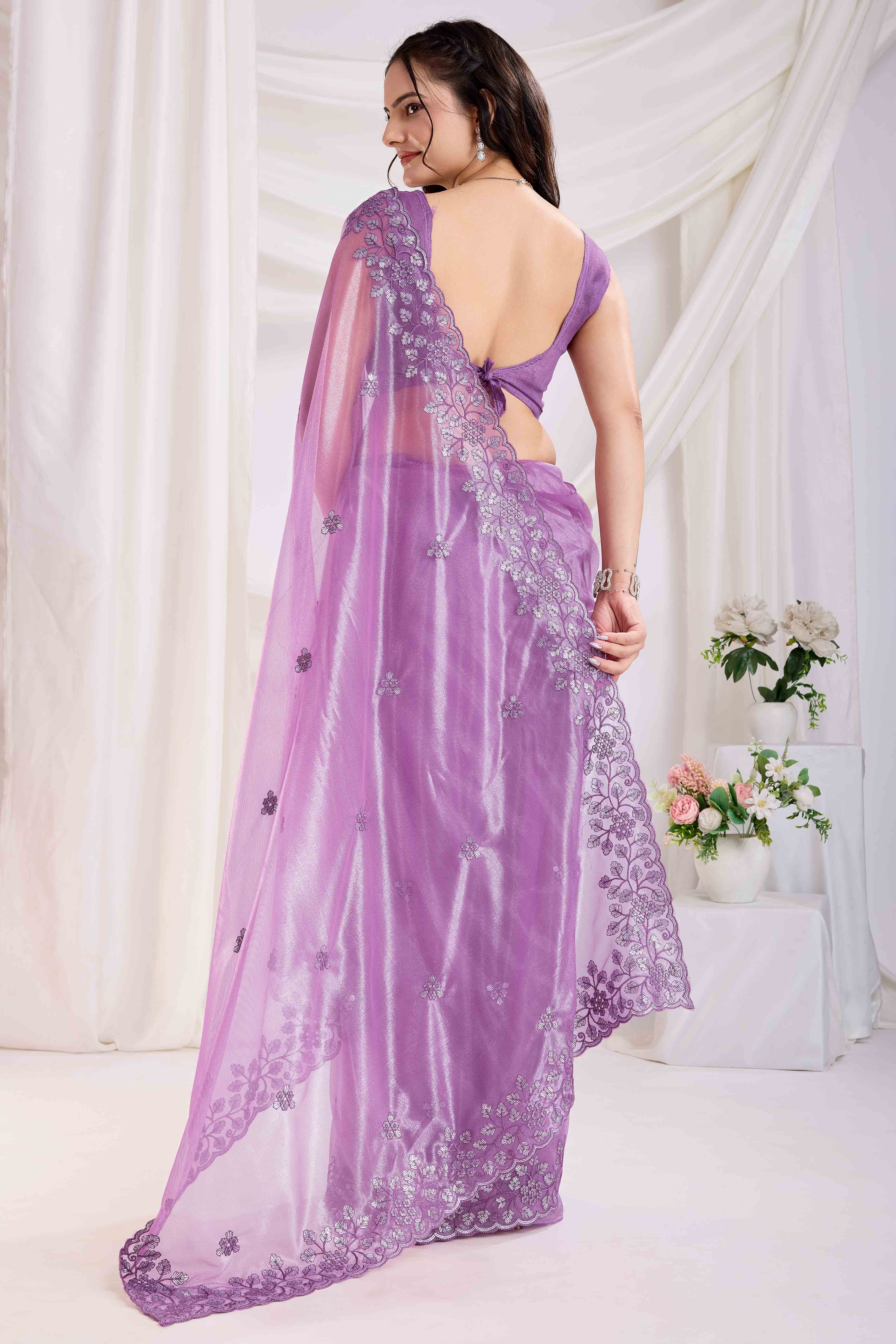Lavender Twill Net Saree Embellished With Sequin Floral Embroidery