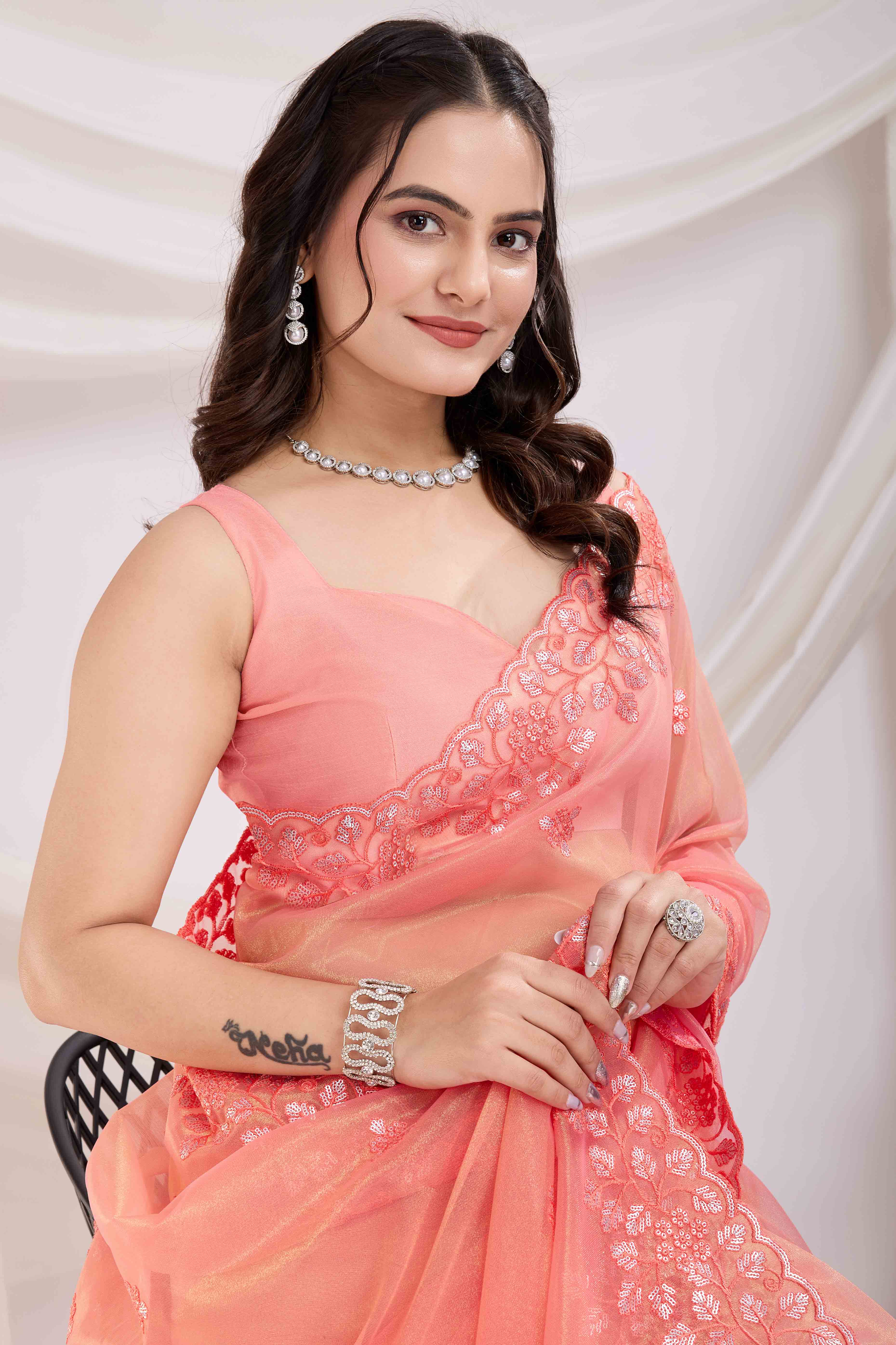 Peach Floral Sequins Embroidered Twill Net Saree