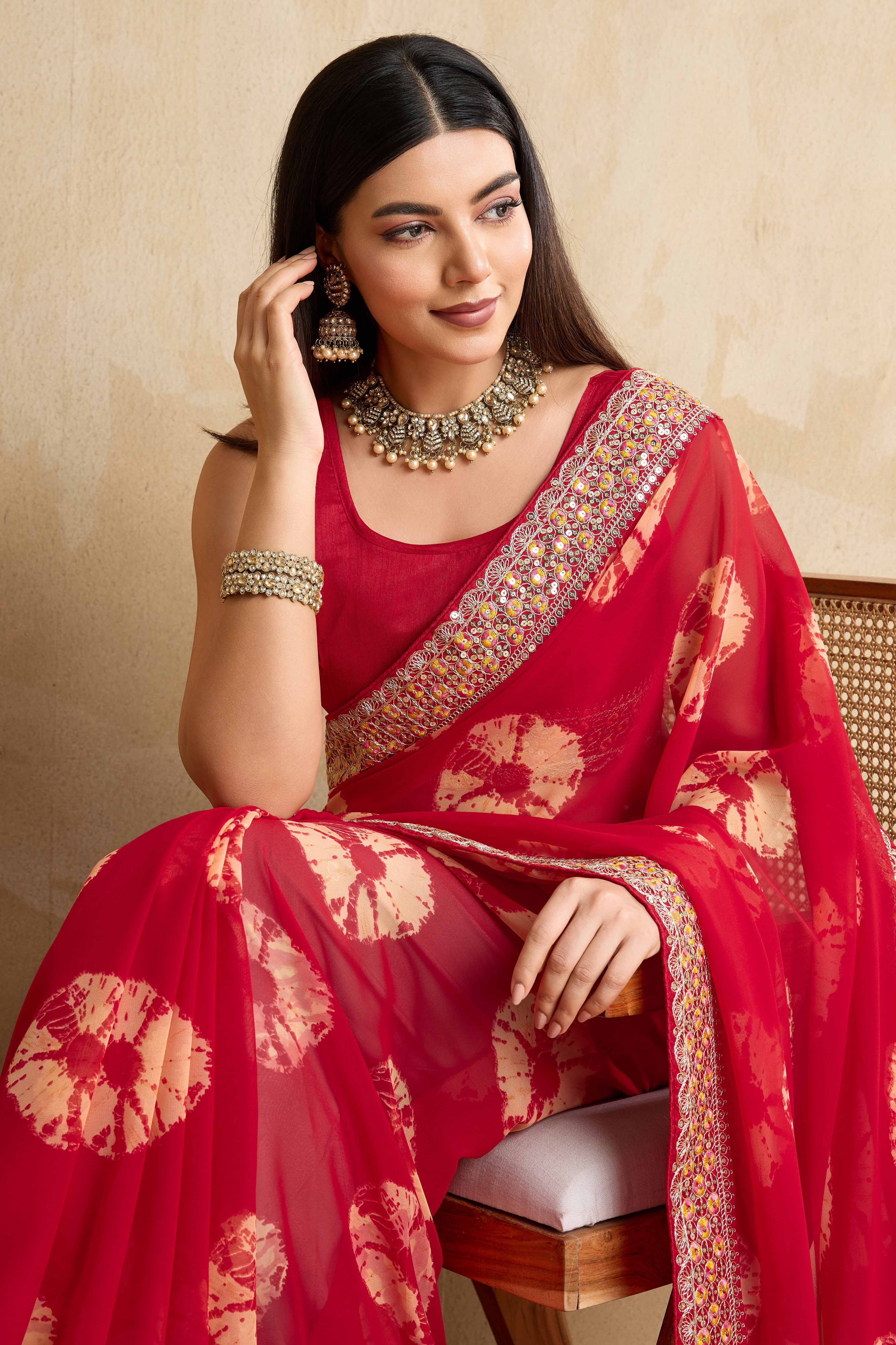 Red Georgette Saree with Contemporary Tie-Dye Patterns and Classic Lace Work Finish