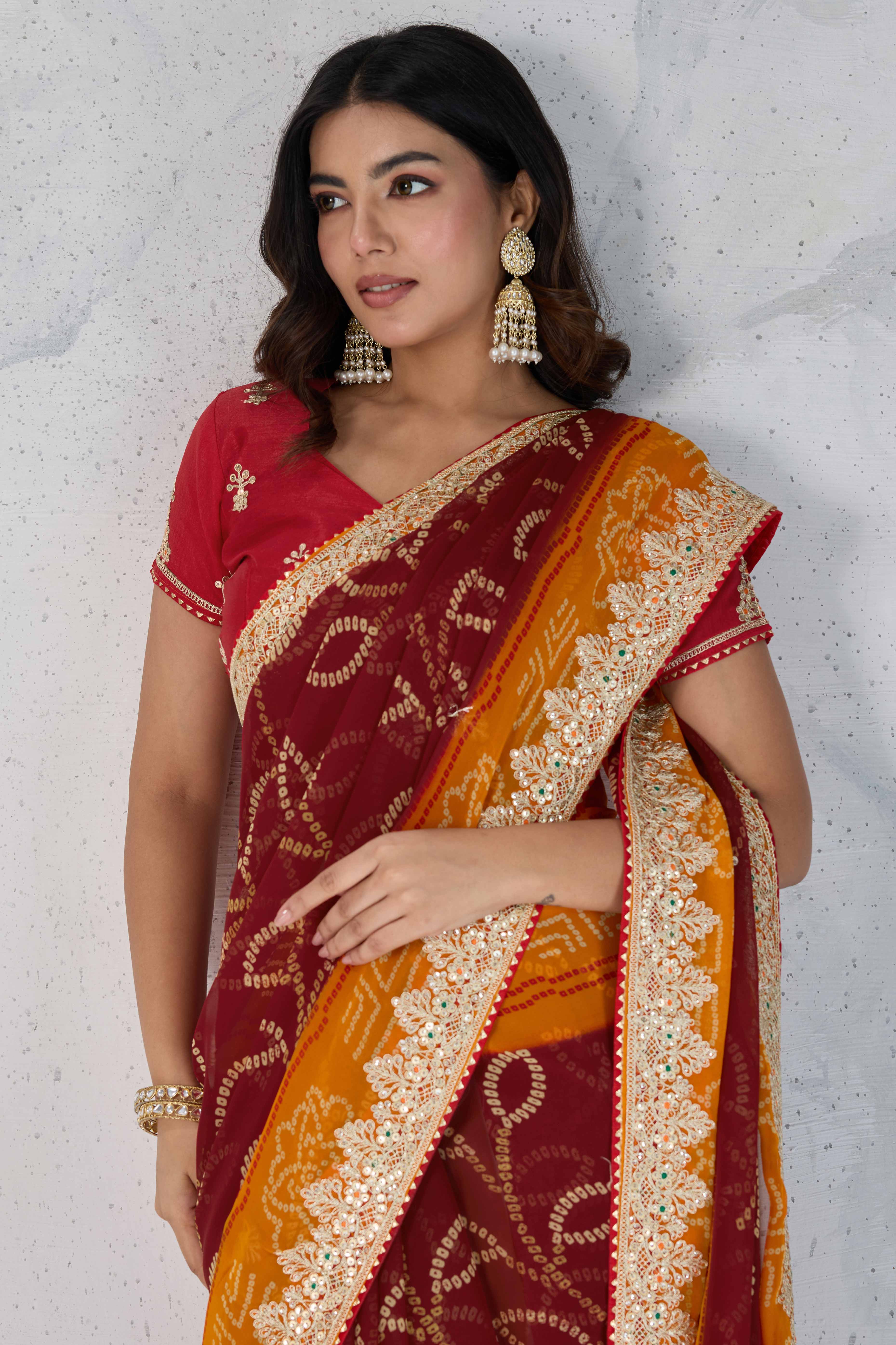 Traditional Bandhani Maroon Georgette Saree with Fine Embroidery