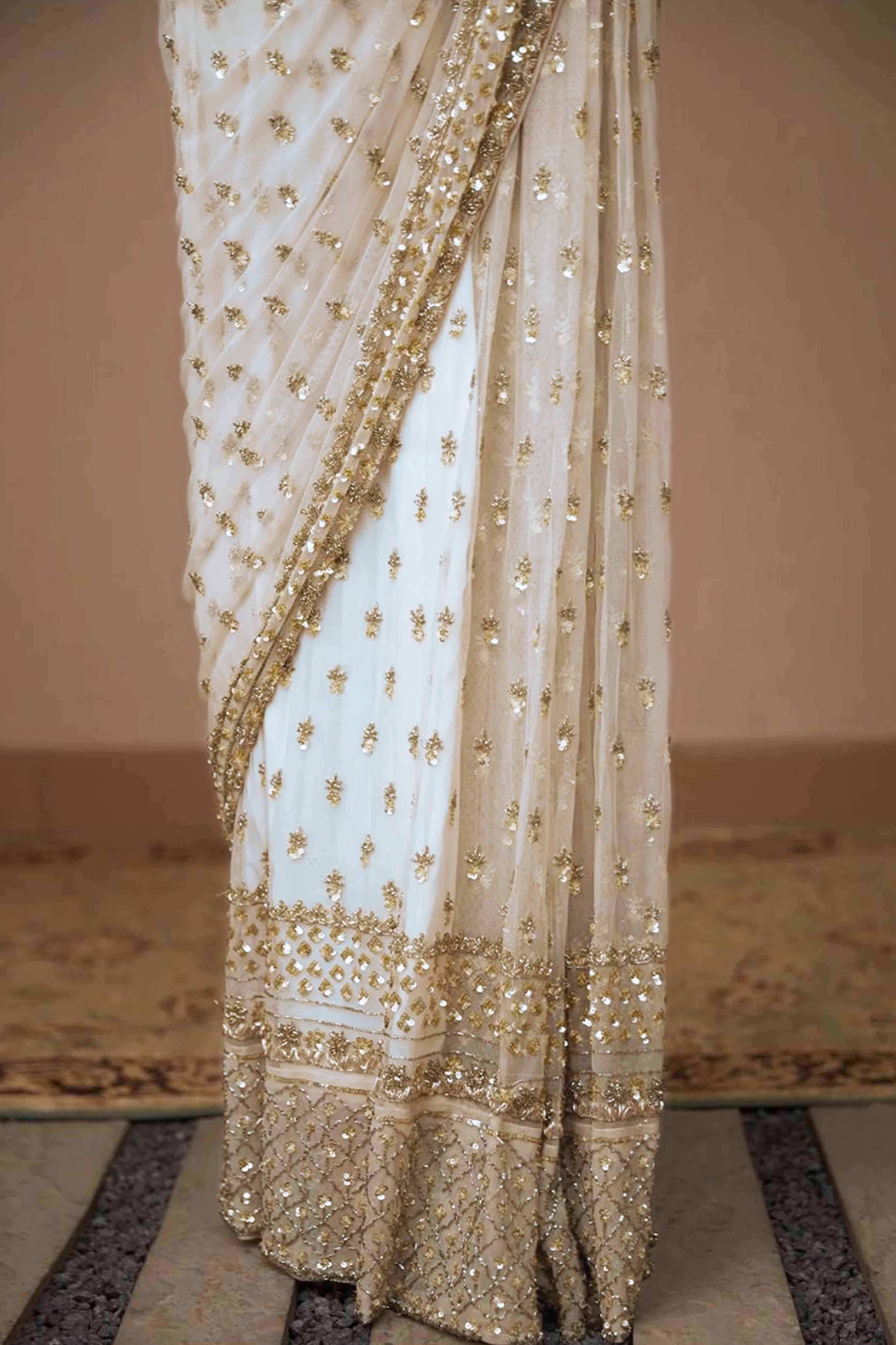Graceful Off White Sequins Embellished Net Saree for Partywear