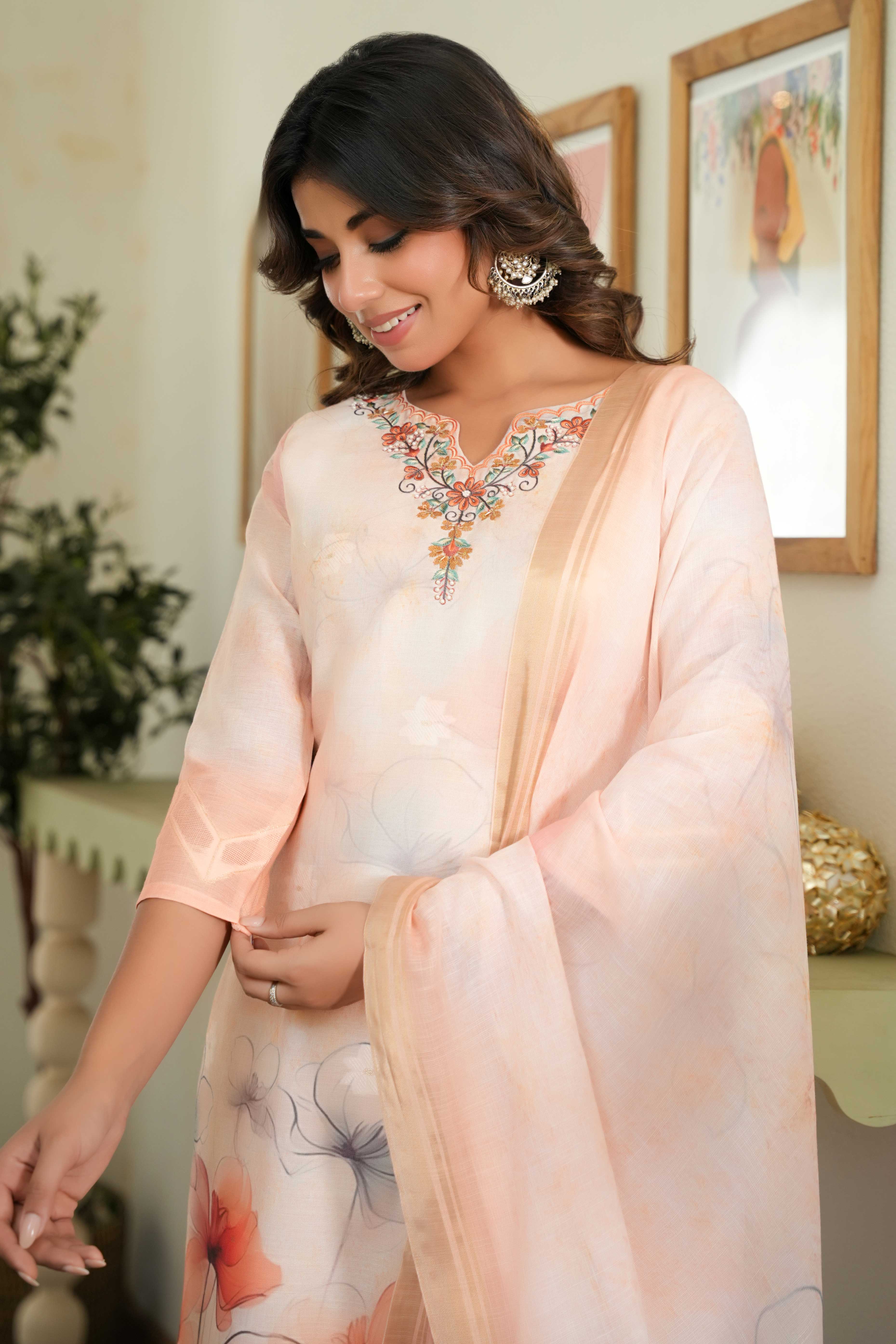 Graceful Light Orange Straight Salwar Suit with Floral Prints on Cotton Jacquard Fabric