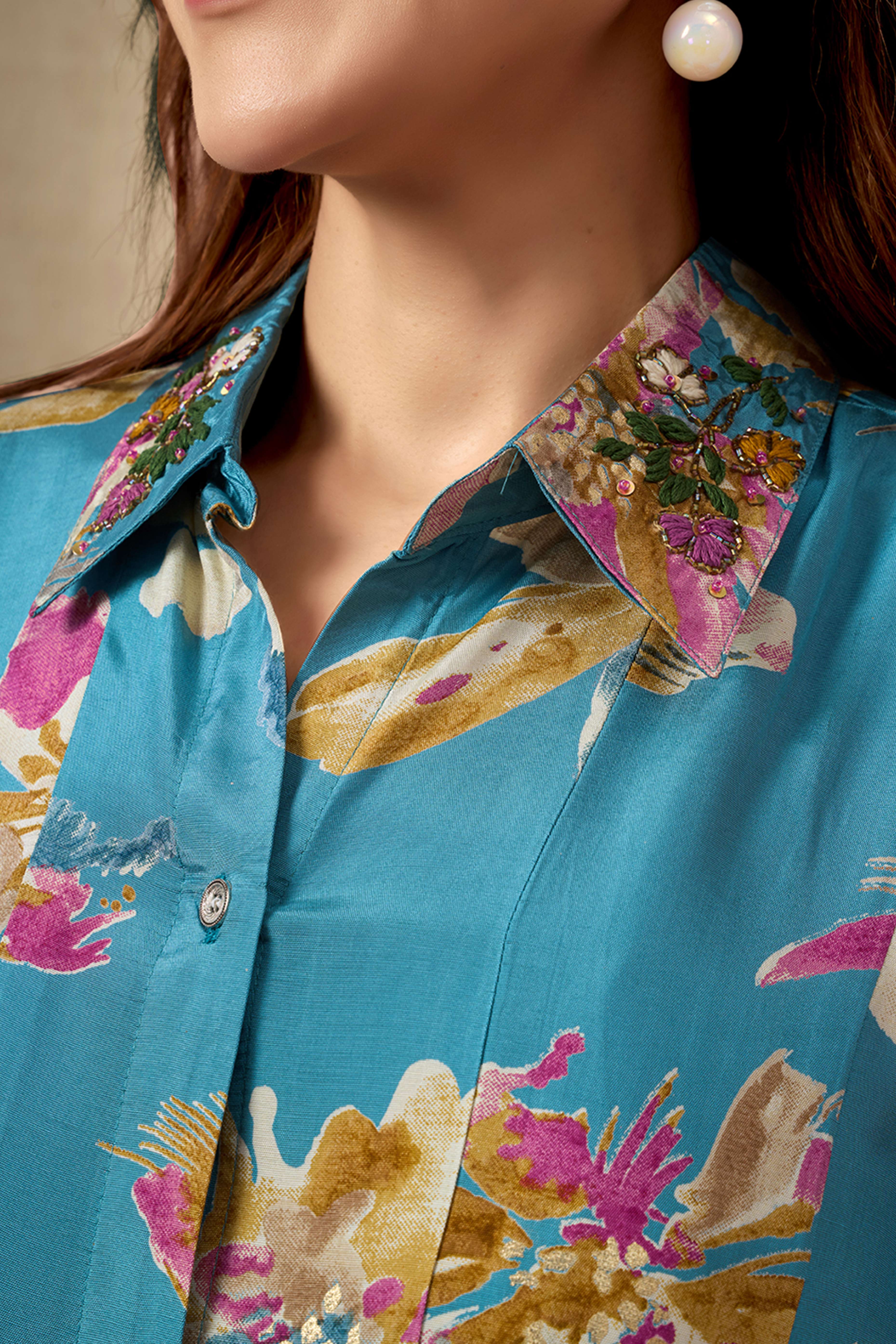 Turquoise Floral Printed Muslin Dress with a Flattering A-Line Silhouette