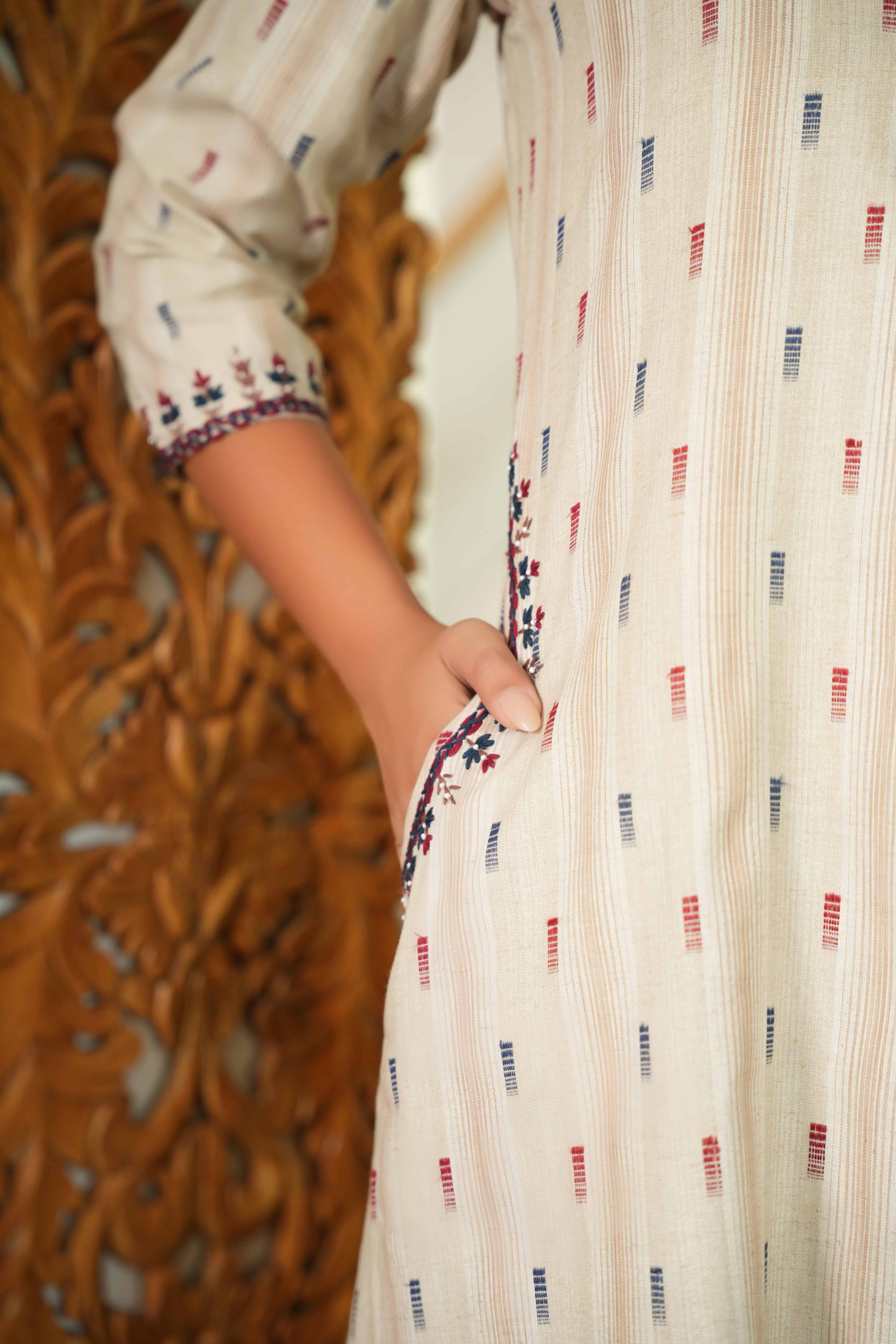 Chic Beige A-Line Pure Cotton Woven Kurti Highlighted with Embroidered Neckline