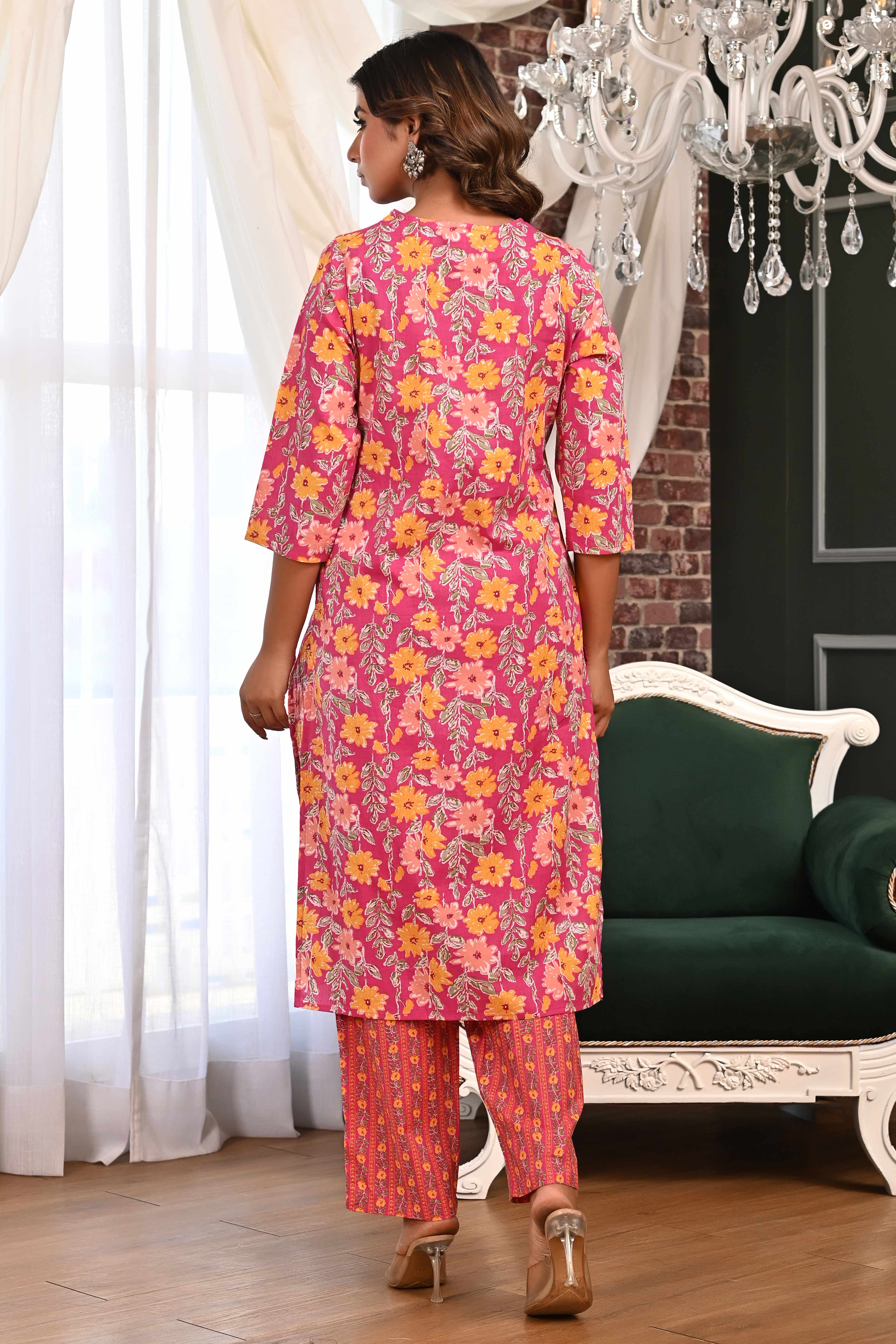 Pink Floral Printed Pure Cotton Straight Cut Suit Accentuated With Graceful Embroidery