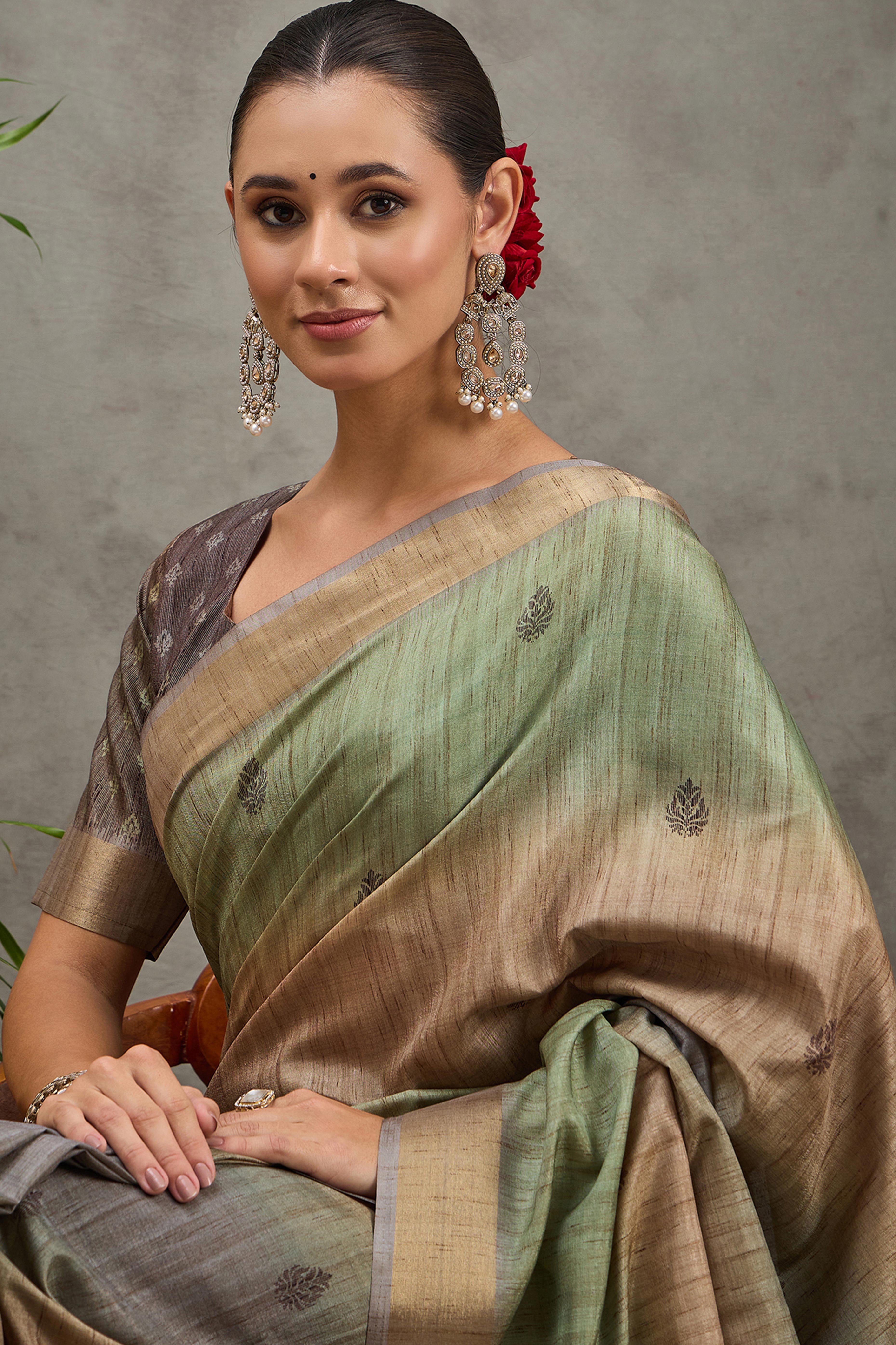 Pista Green Festive Wear Art Silk Saree Featuring Intricate Floral Weaving