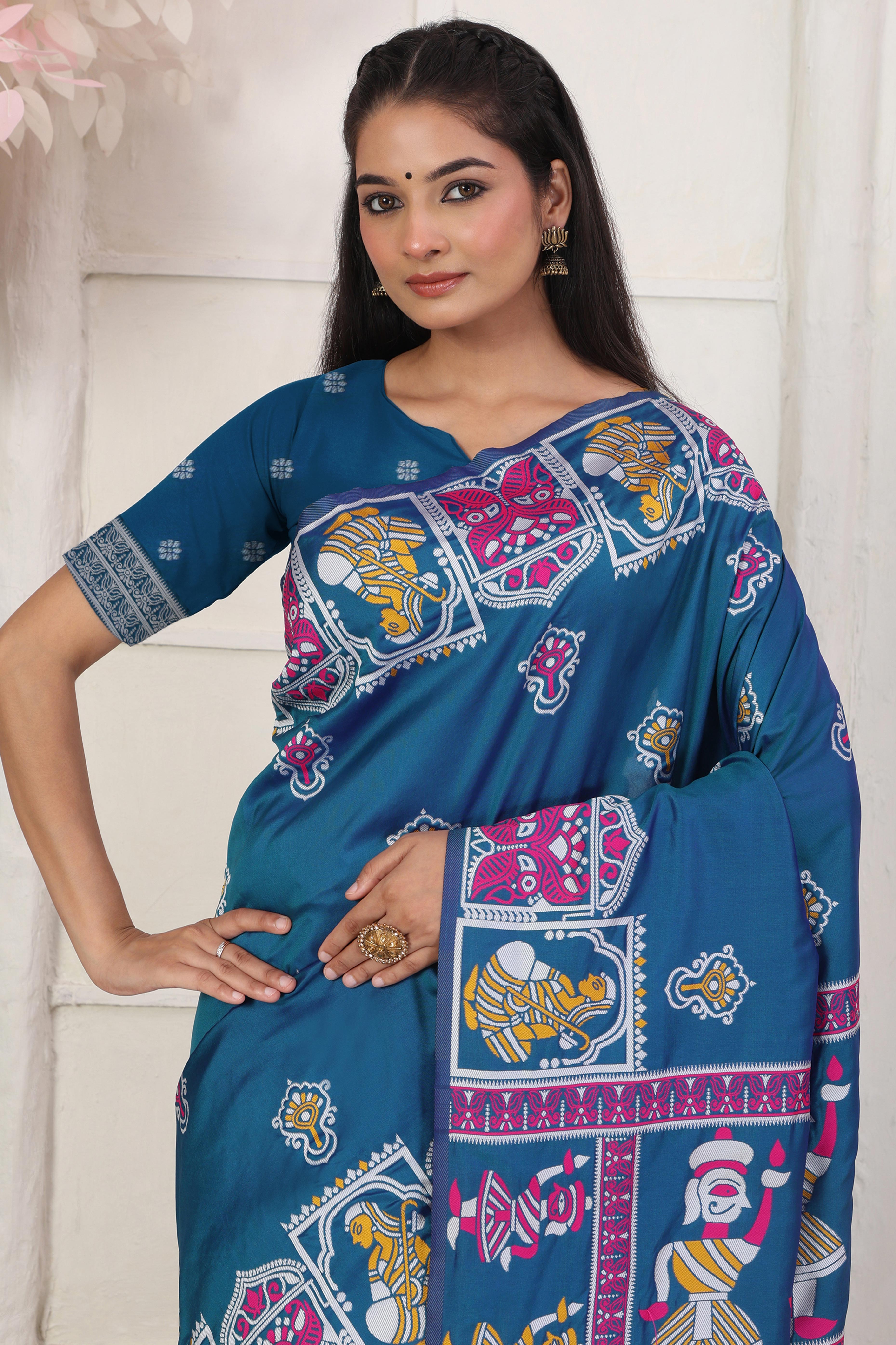 Teal Blue Ethnic Madhubani Print Silk Blend Saree Enhanced With Tassel Pallu Accents