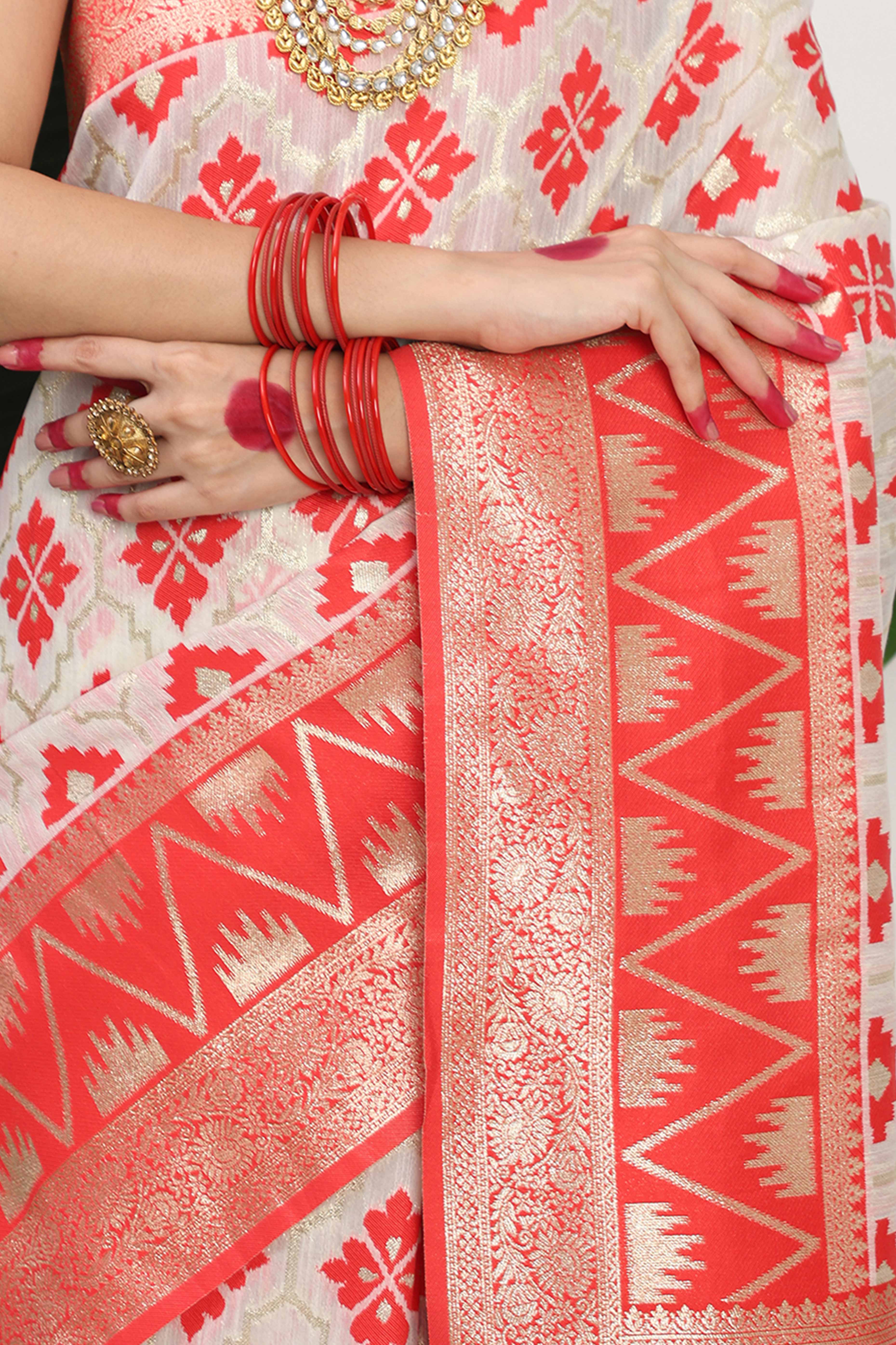 Vibrant White & Red Linen Cotton Saree Featuring Timeless Zari Weaving And Elegant Tassel Pallu