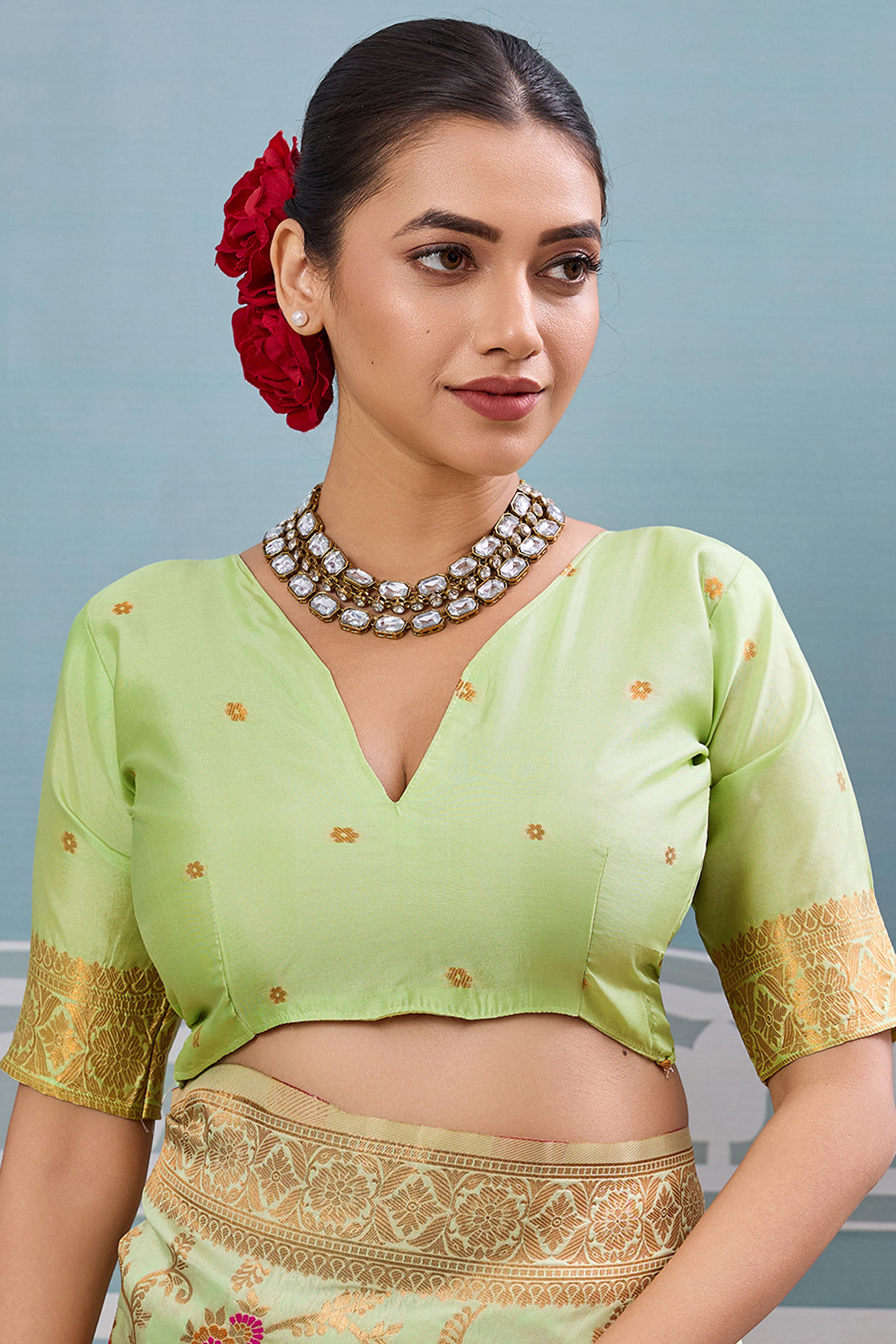 Majestic Bloom Pista Green Floral Zari Weaving Silk Blend Saree With Elegant Tassel Pallu