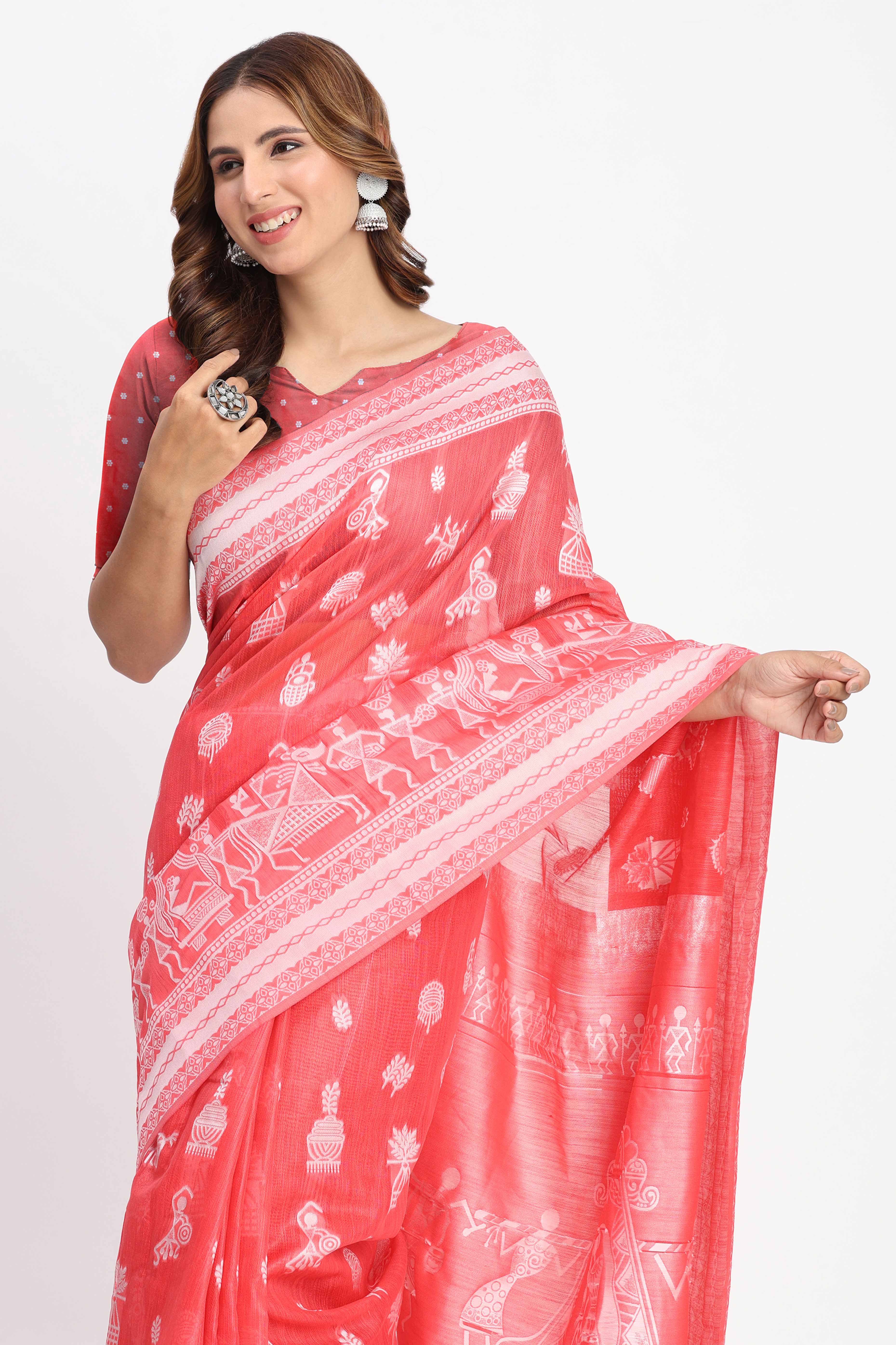 Coral Pink Linen Cotton Saree Showcasing Traditional Warli Motifs In Zari Weaving With Tassel Pallu
