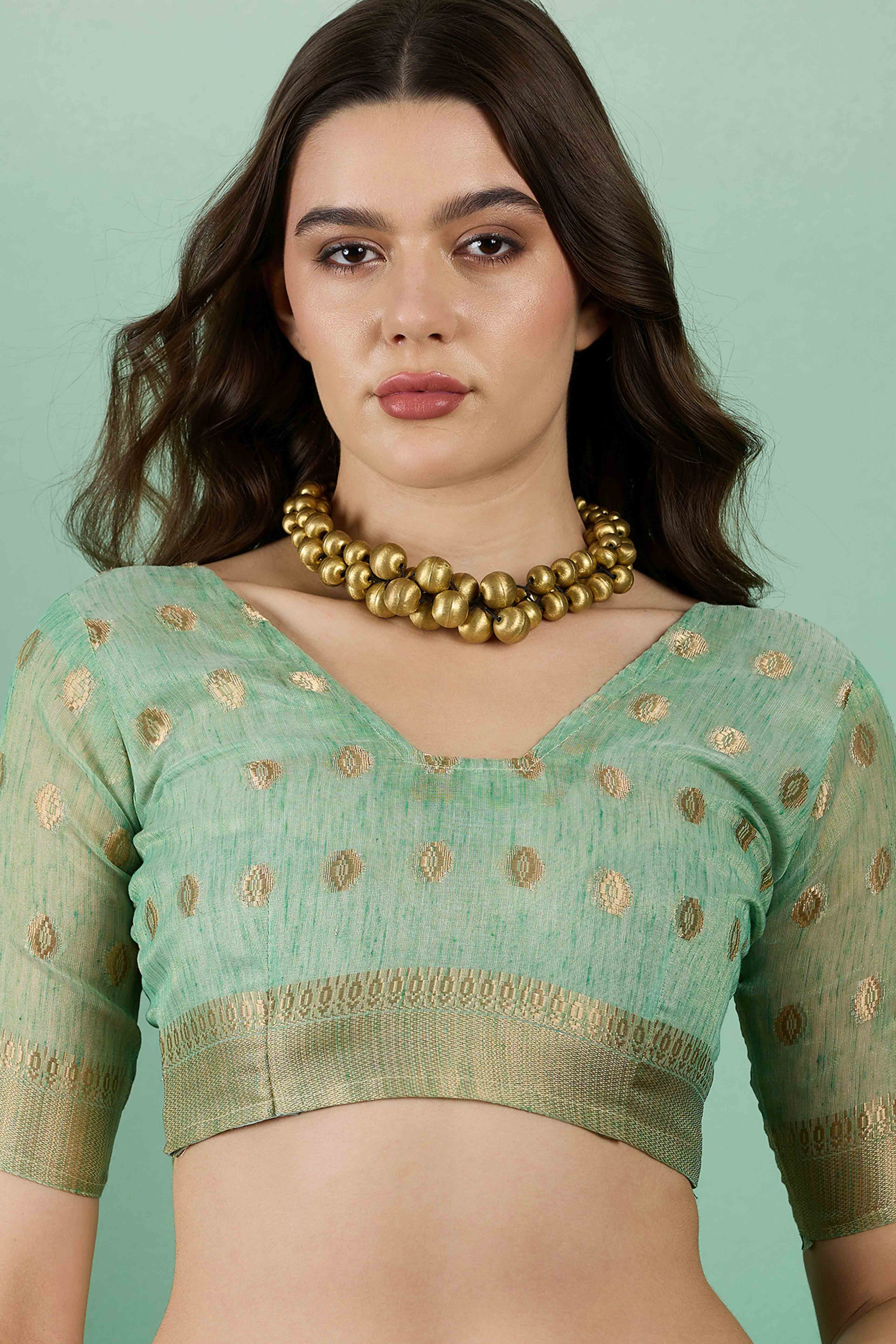 Green Khadi Organza Saree Embellished With Traditional Zari Work & Tassels