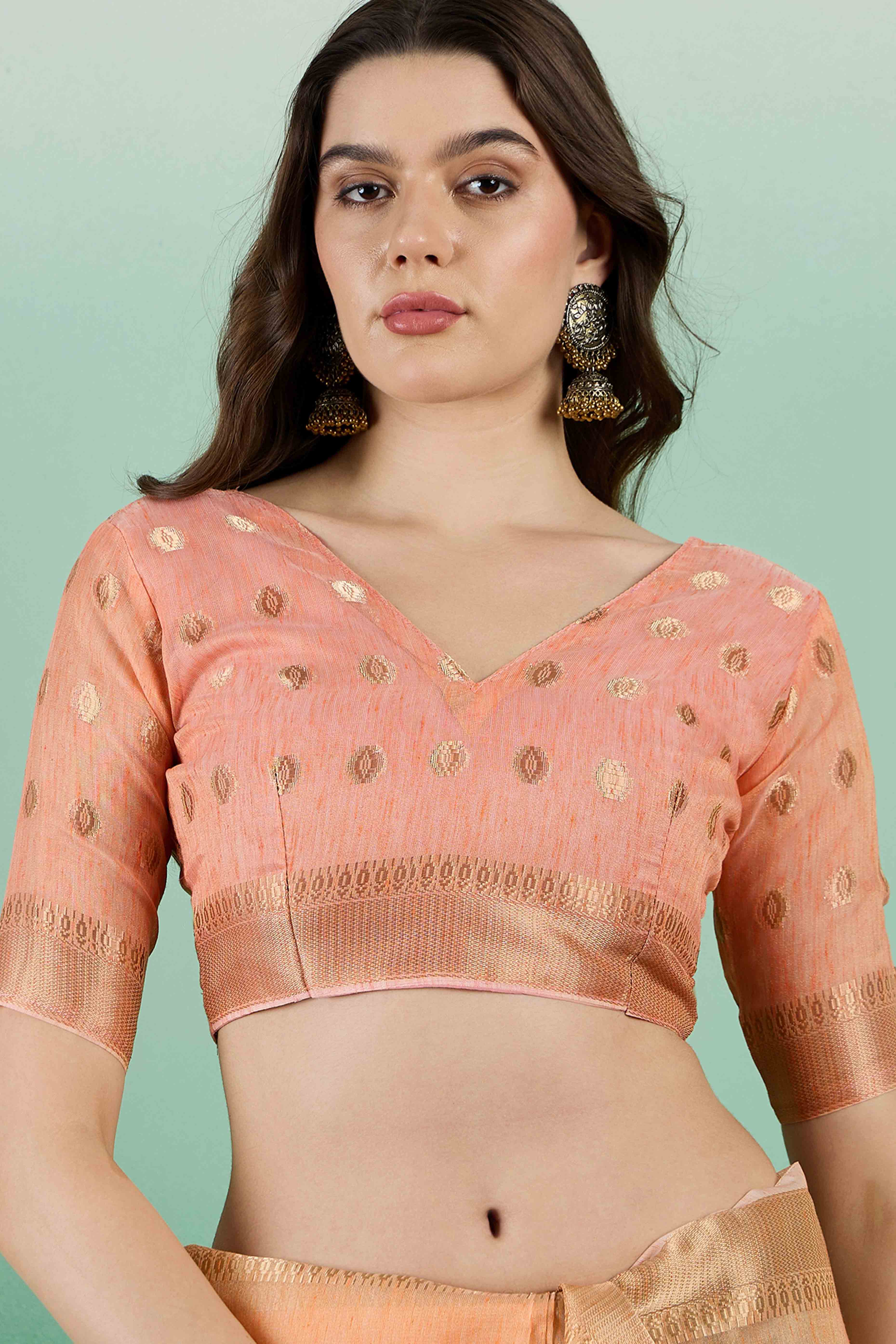 Orange Khadi Organza Saree Embellished With Traditional Zari Work & Tassels