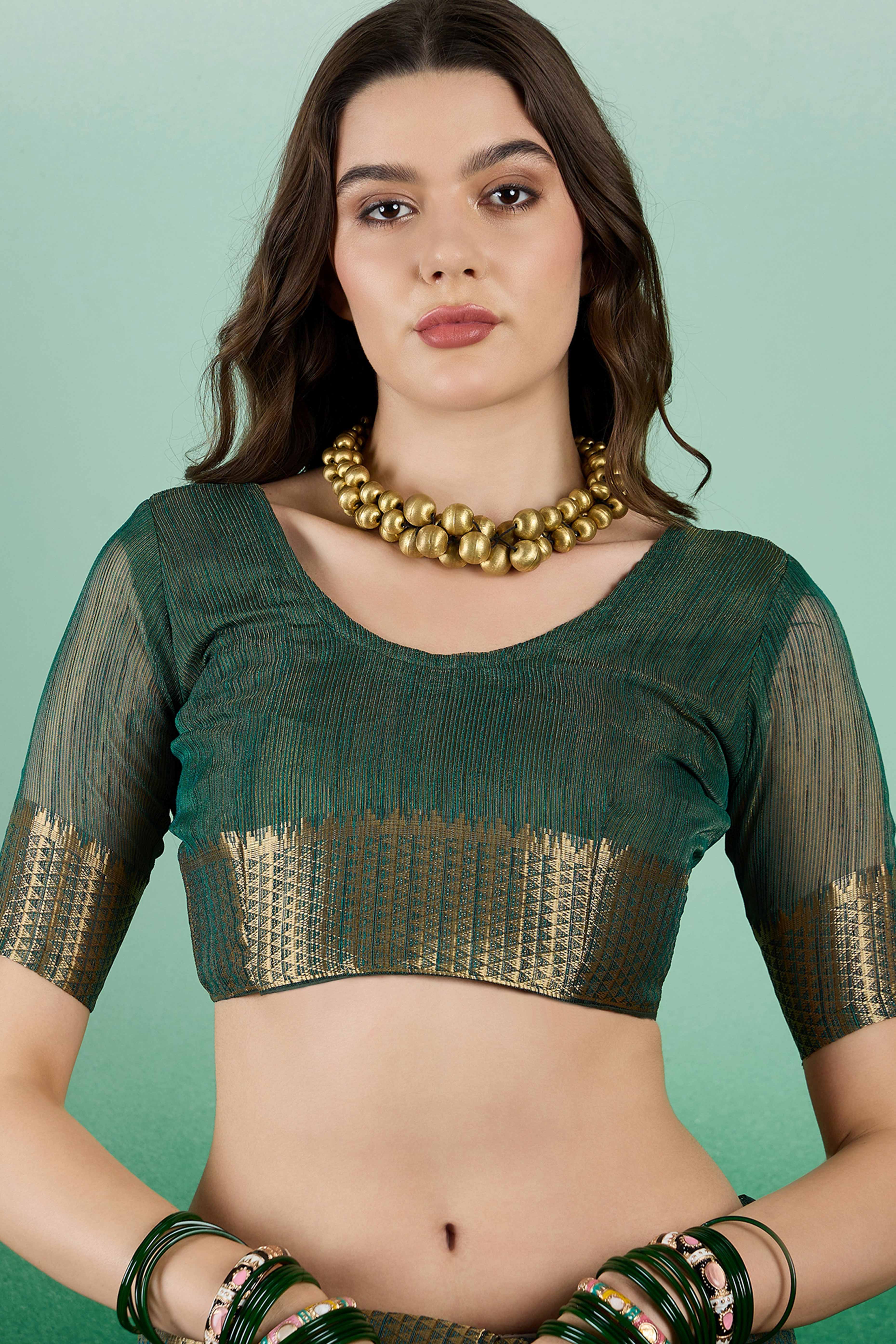 Green Khadi Organza Saree Adorned With Elegant Embroidery & Tassel Pallu