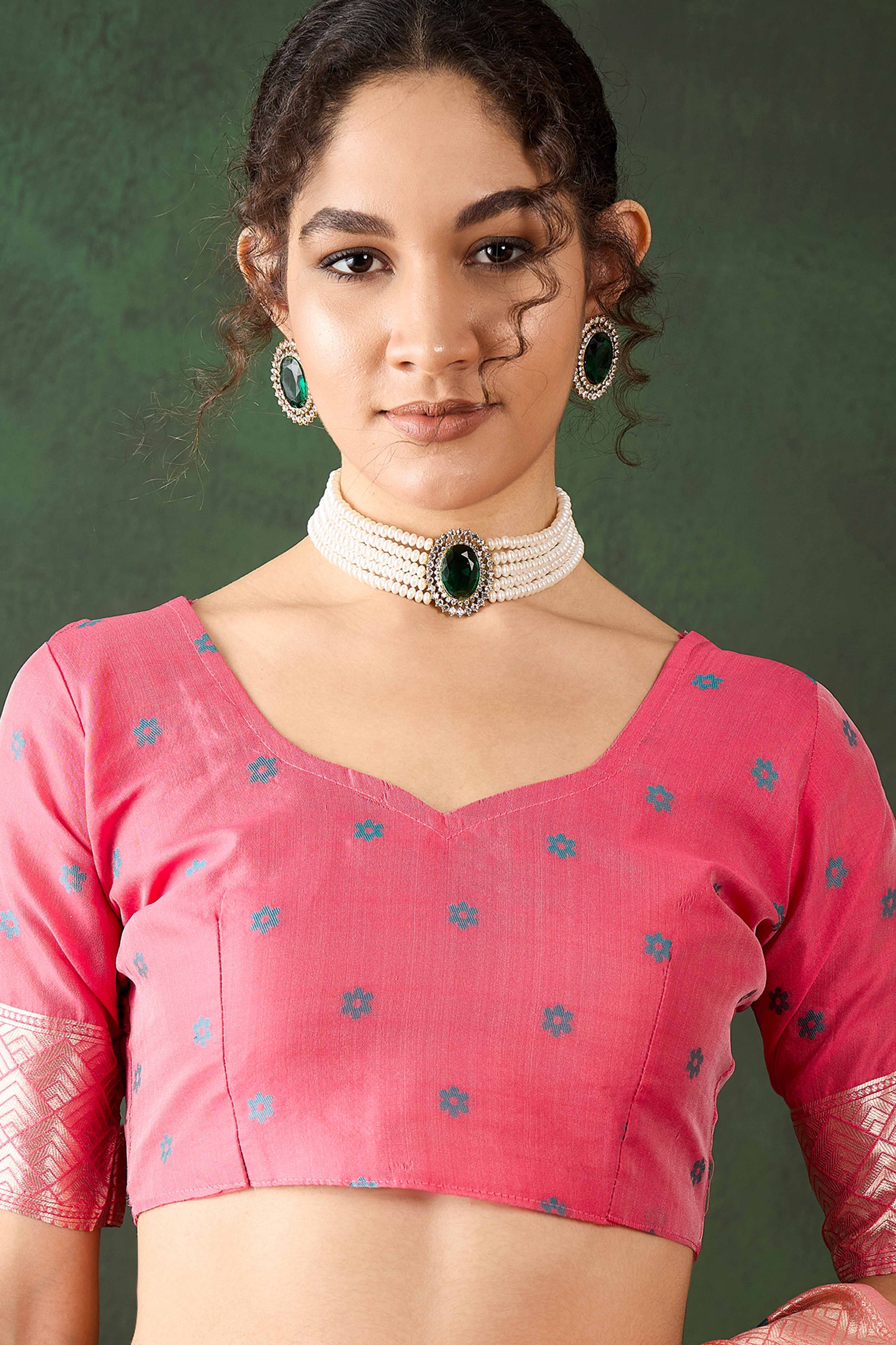 Peach Cotton Blend Saree Adorned With Intricate Floral Zari Weaving & A Stylish Tassel Pallu