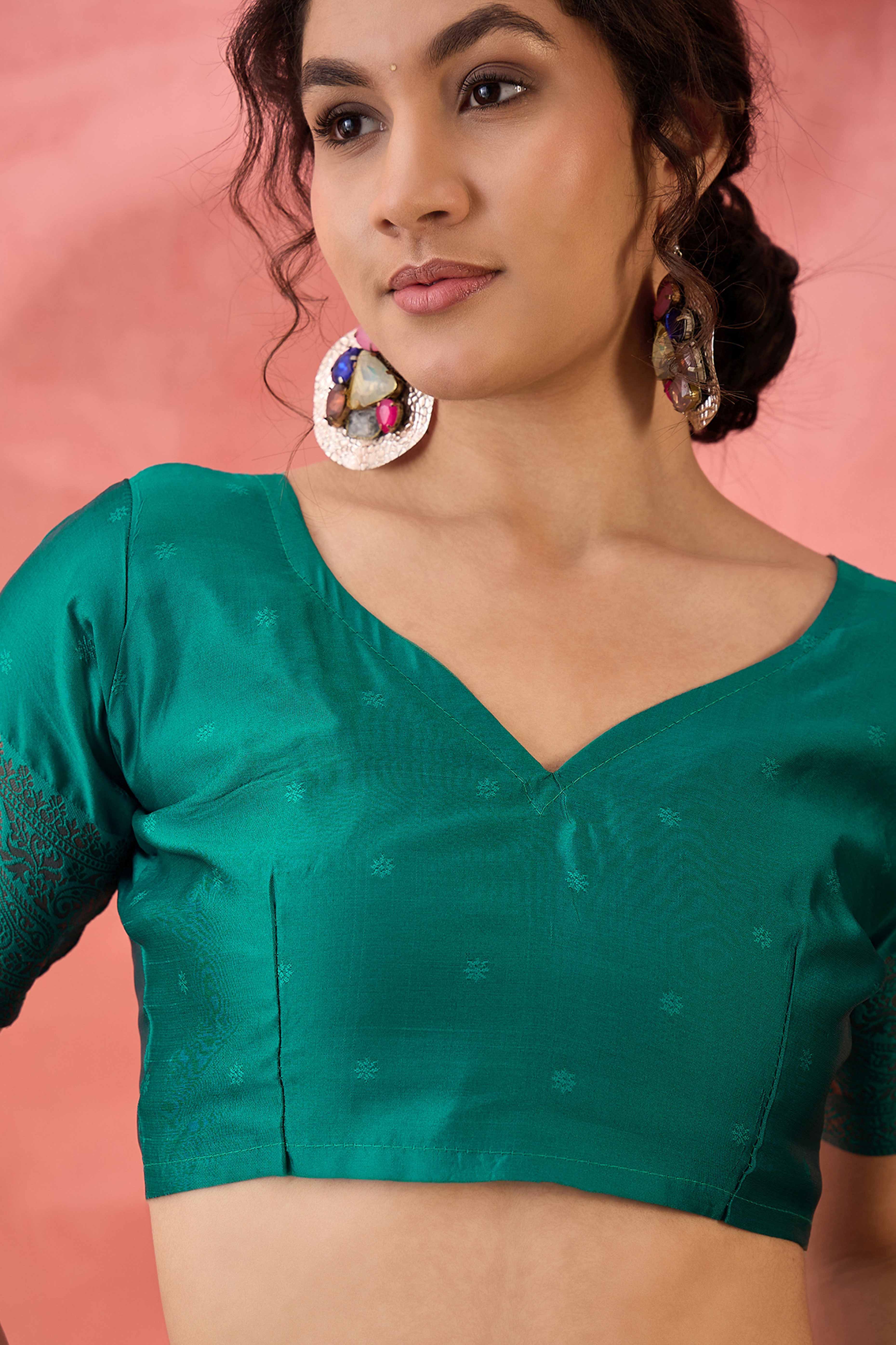 Rama Green Woven Poly Silk Blend Saree Featuring Floral & Paisley Motifs With Tassel Accents