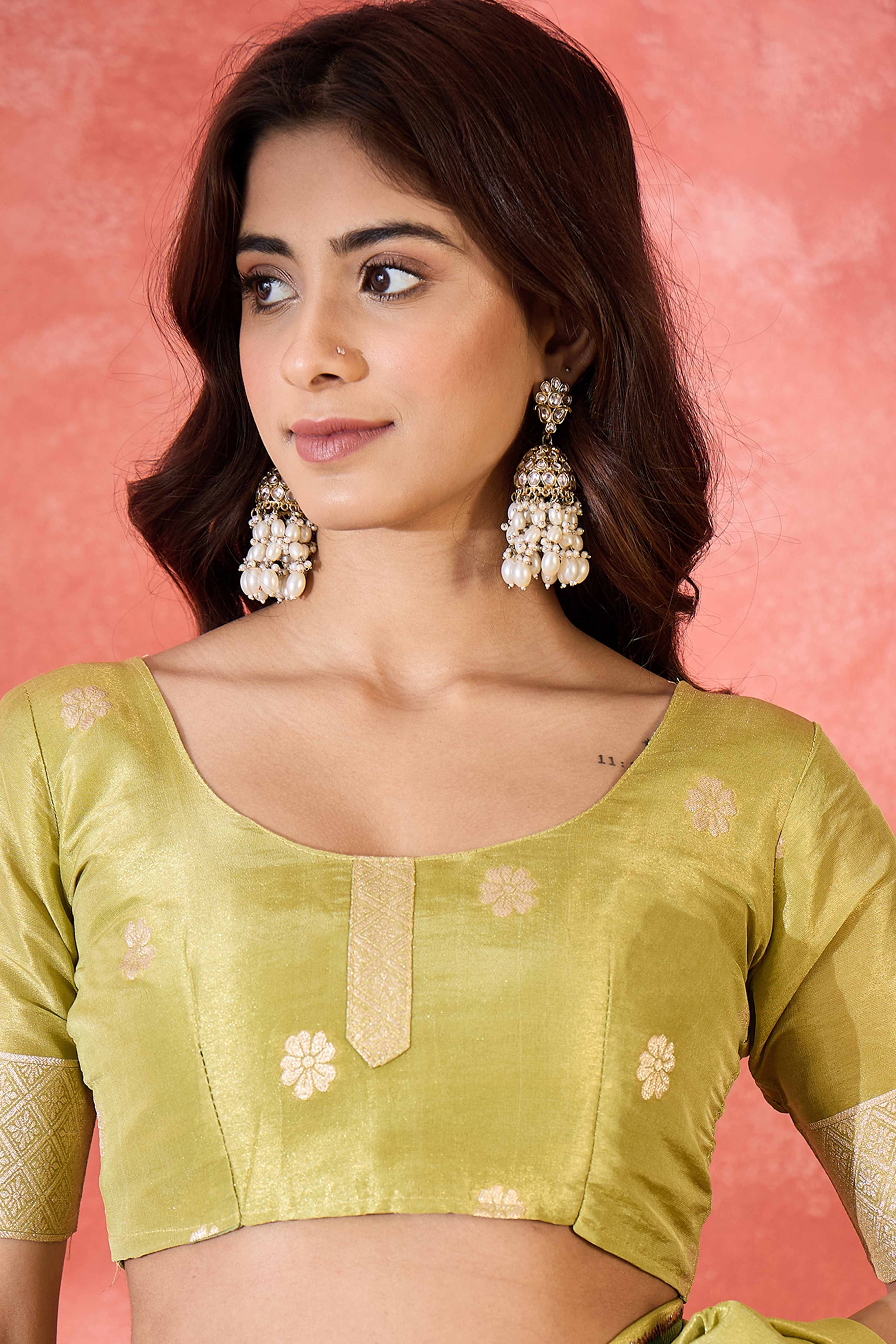 Lime Green Saree In Shimmer Fabric With Floral Zari Weaving & Decorative Tassel Pallu