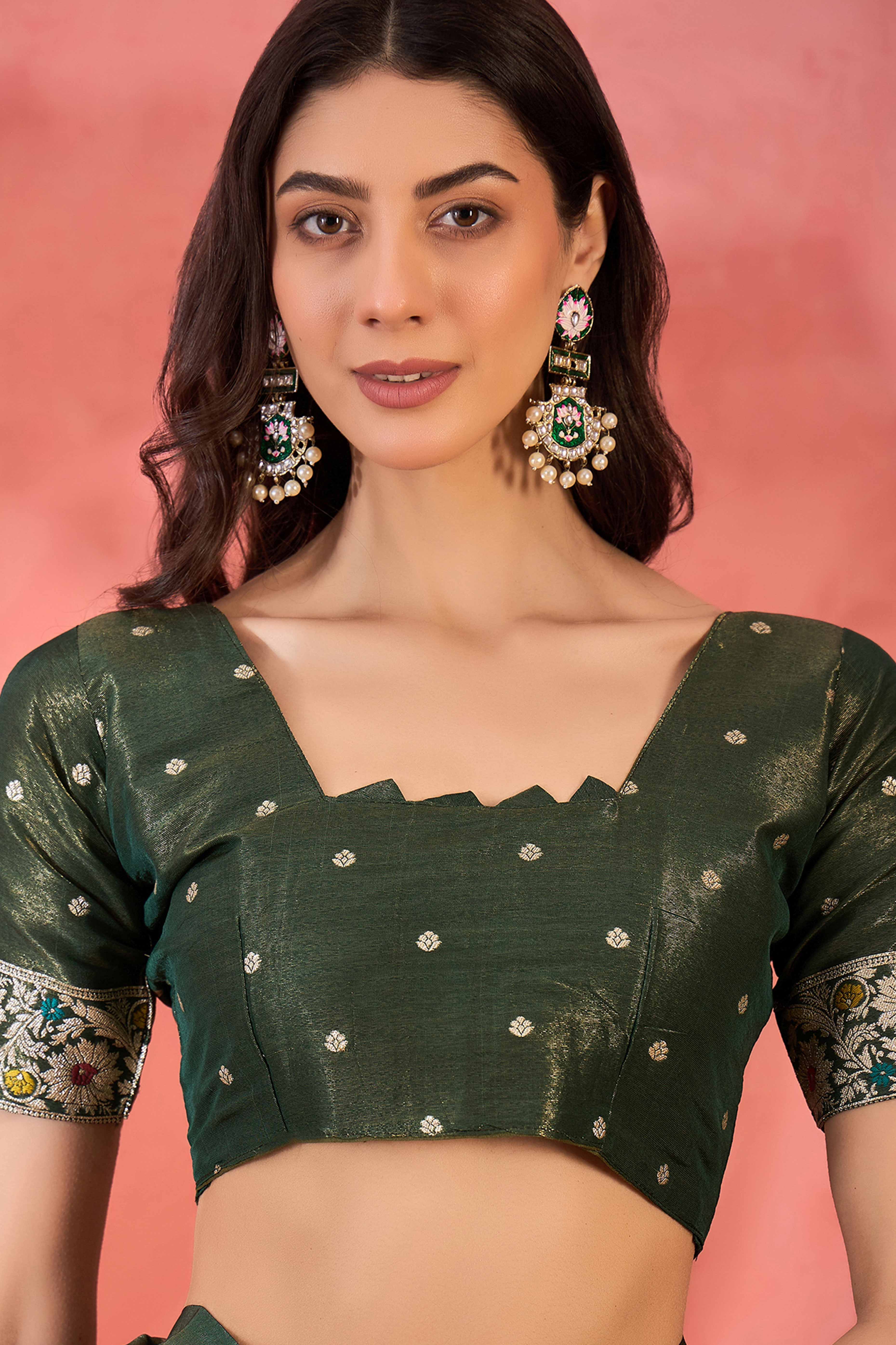 Green Zari Woven Shimmer Saree With Floral Motifs & Flowing Tassel Pallu