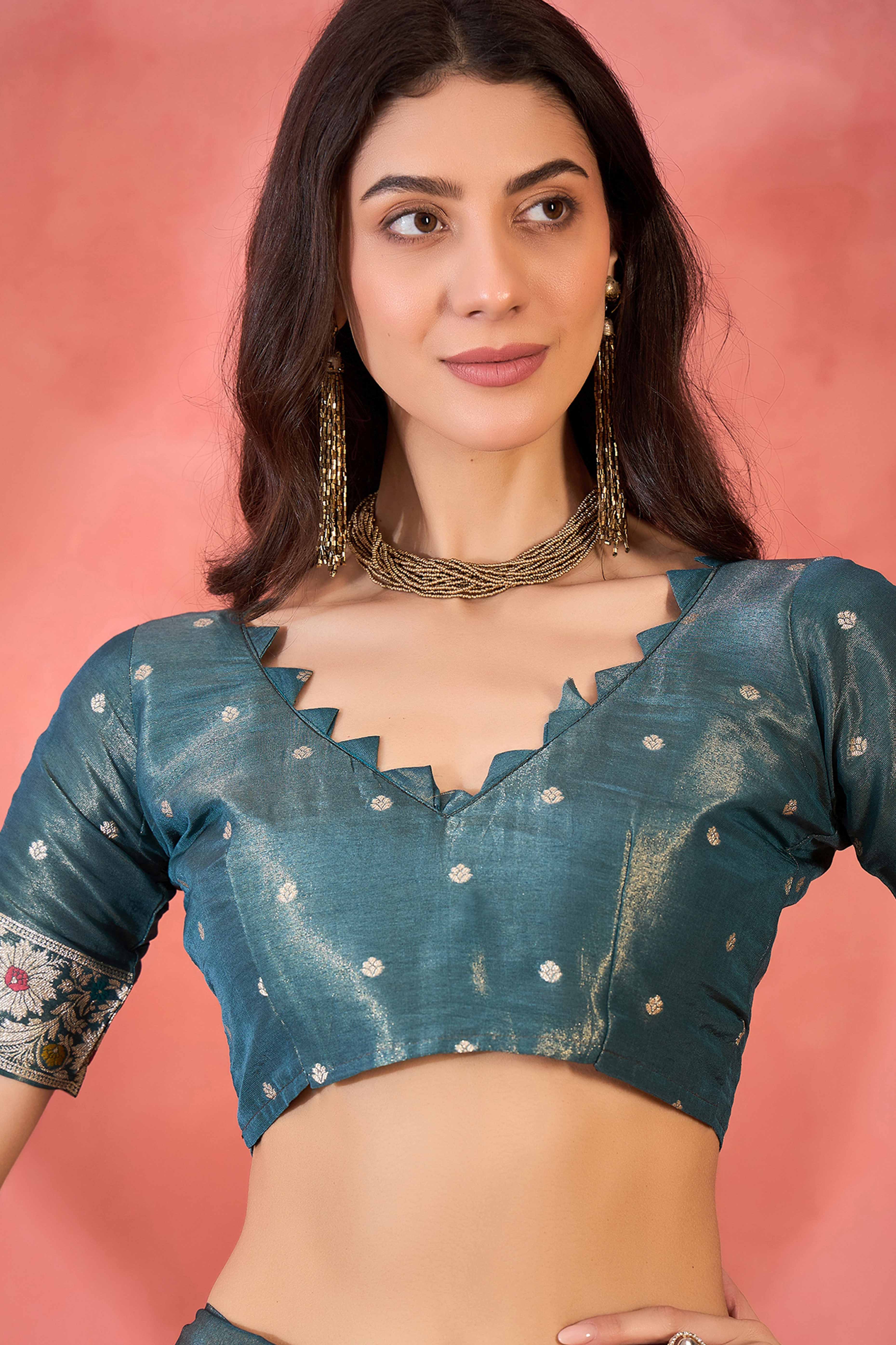 Teal Blue Zari Woven Shimmer Saree With Floral Motifs & Flowing Tassel Pallu