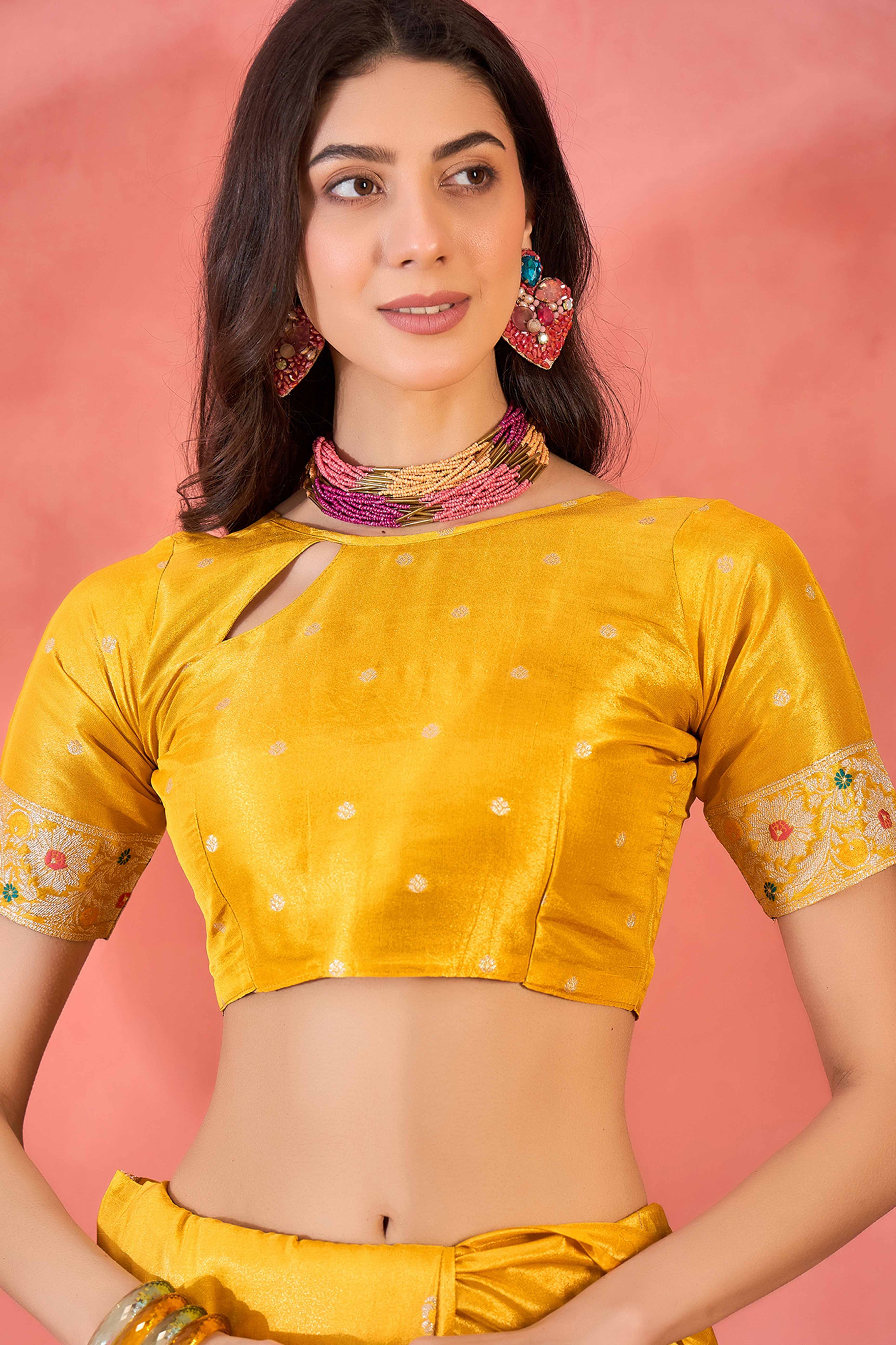 Yellow Zari Woven Shimmer Saree With Floral Motifs & Flowing Tassel Pallu