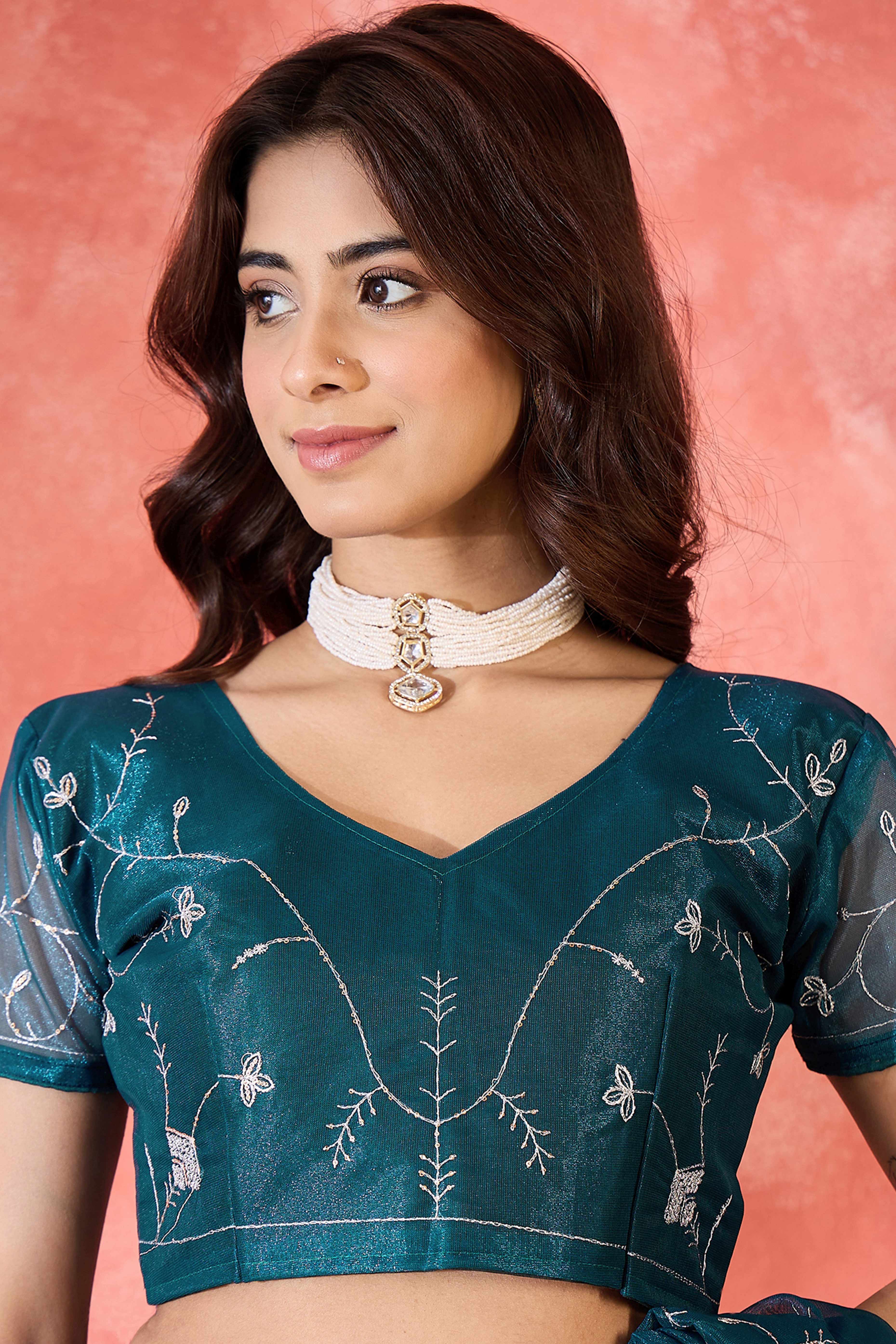 Teal Floral Sequin Embellished Saree In Twill Net With Tassel Accents