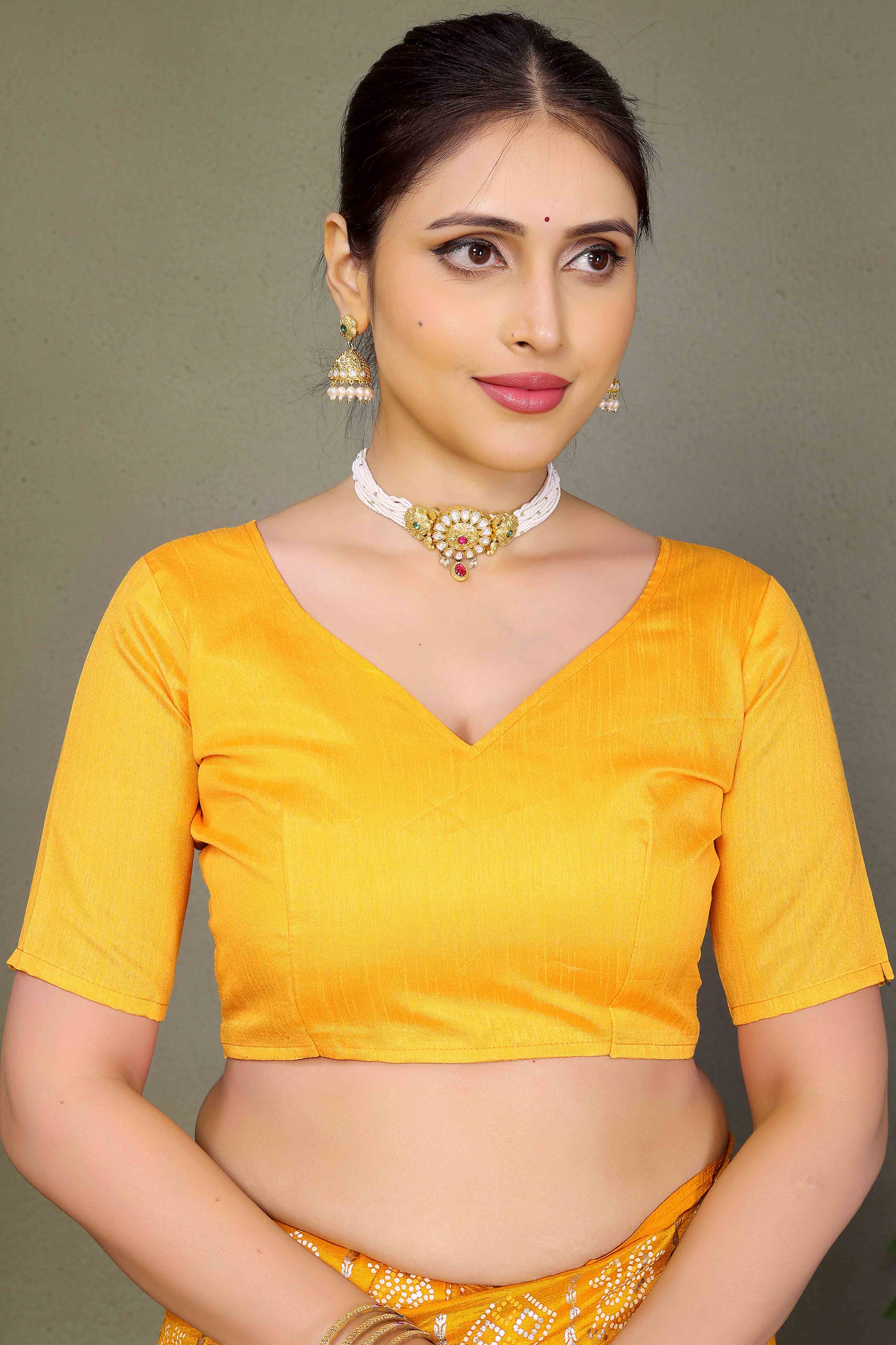 Yellow Vichitra Silk Saree Featuring Bandhani Patterns and Graceful Embroidered Borders