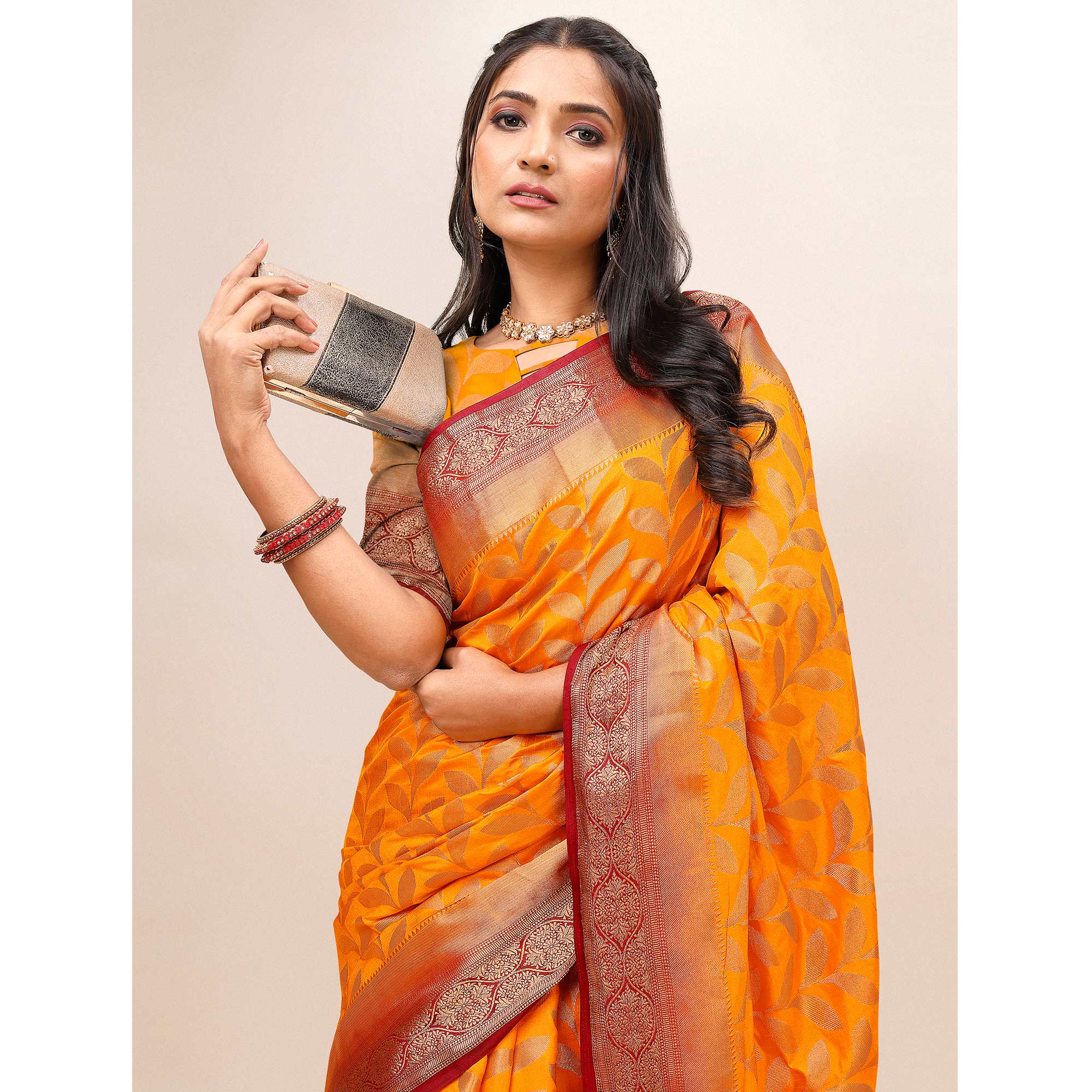 Orange Woven Dola Silk Saree With Tassels