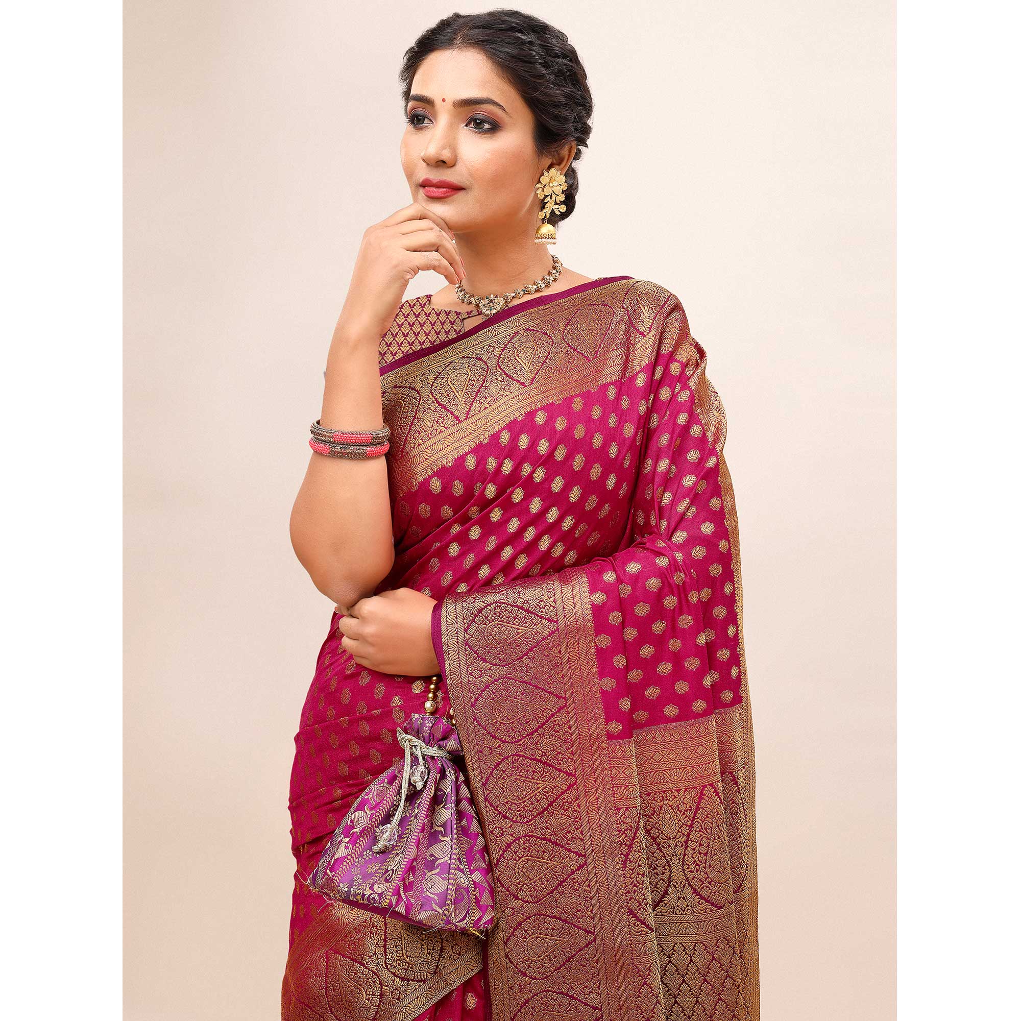 Rani Pink Woven Dola Silk Saree With Tassels