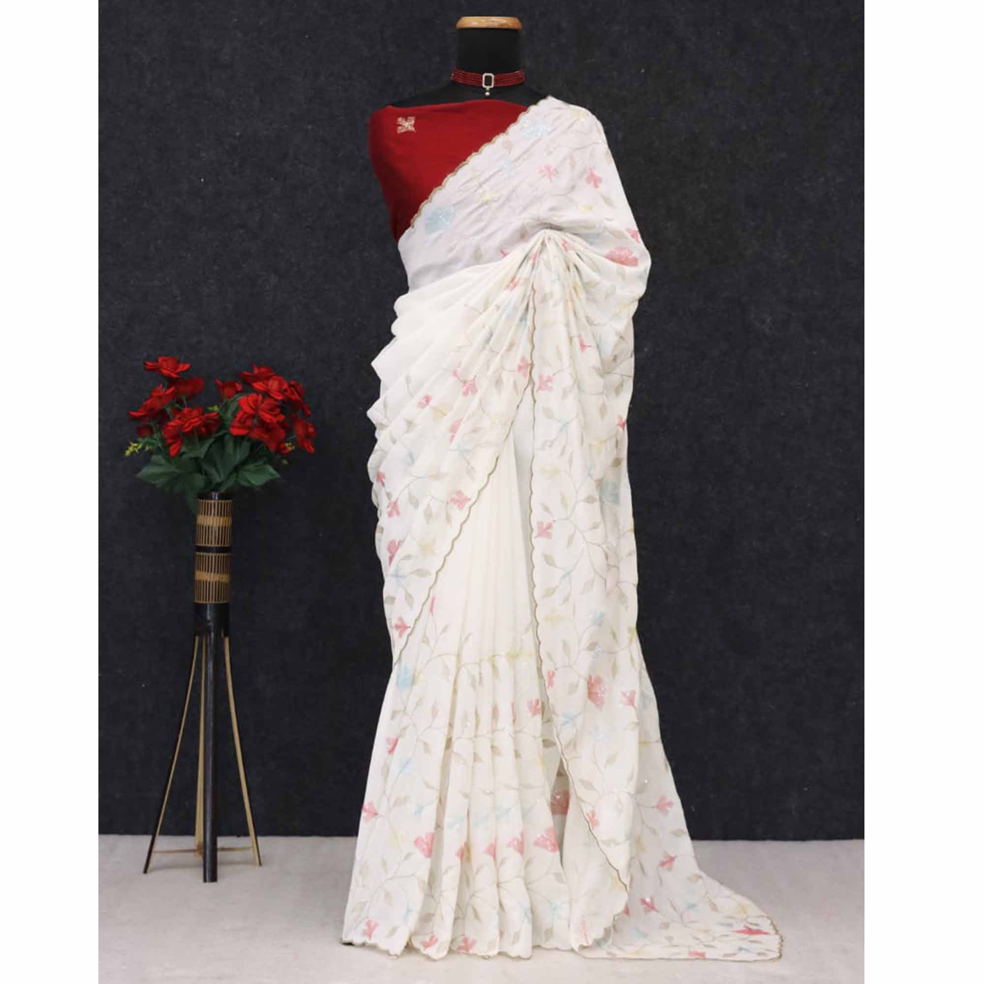 Graceful White Vichitra Silk Saree Adorned With Floral Sequins Embroidery & Golden Arco Border