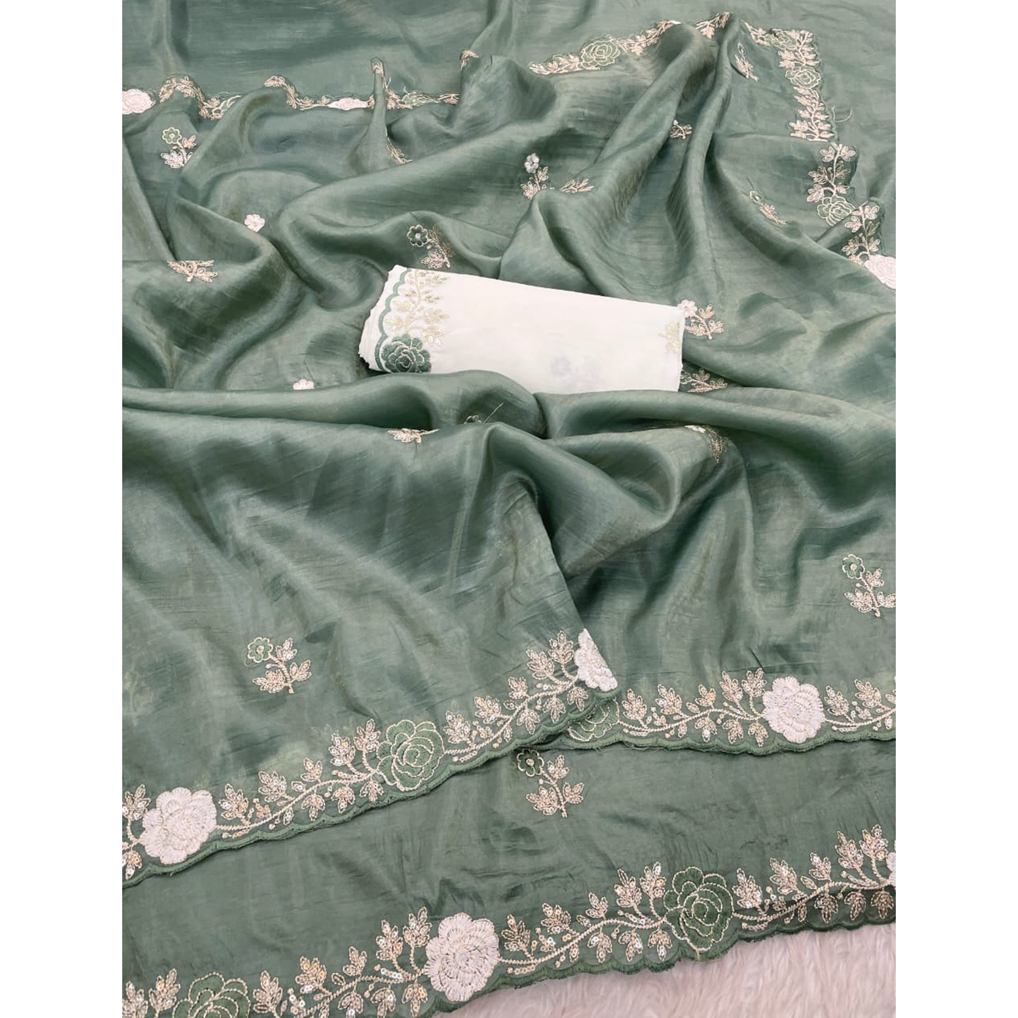 Green Lightweight Georgette Crush Saree Adorned with Delicate Floral Embroidery
