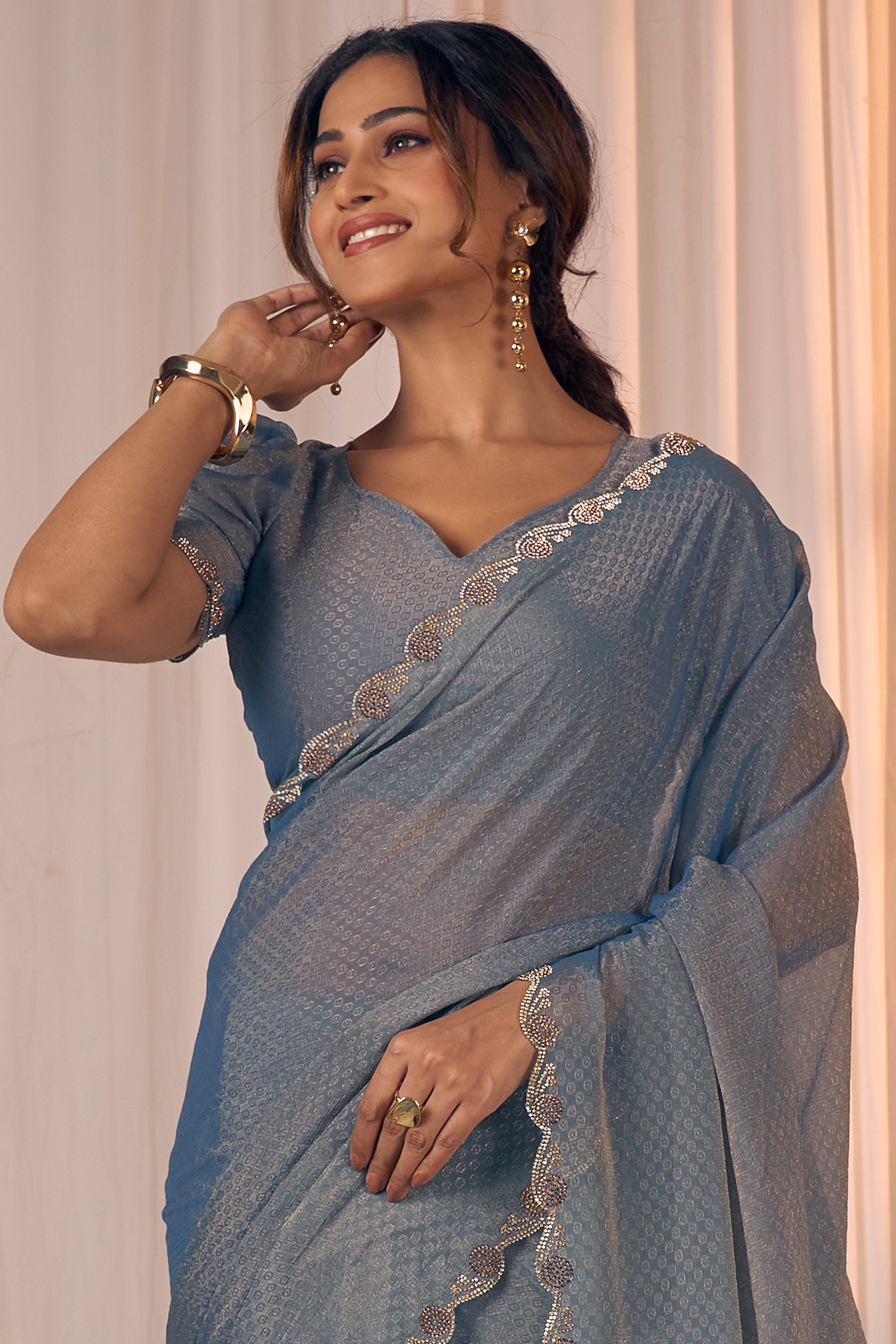 Designer Bluish Grey Georgette Saree Adorned With An Elegant Zarkan Cutwork Border