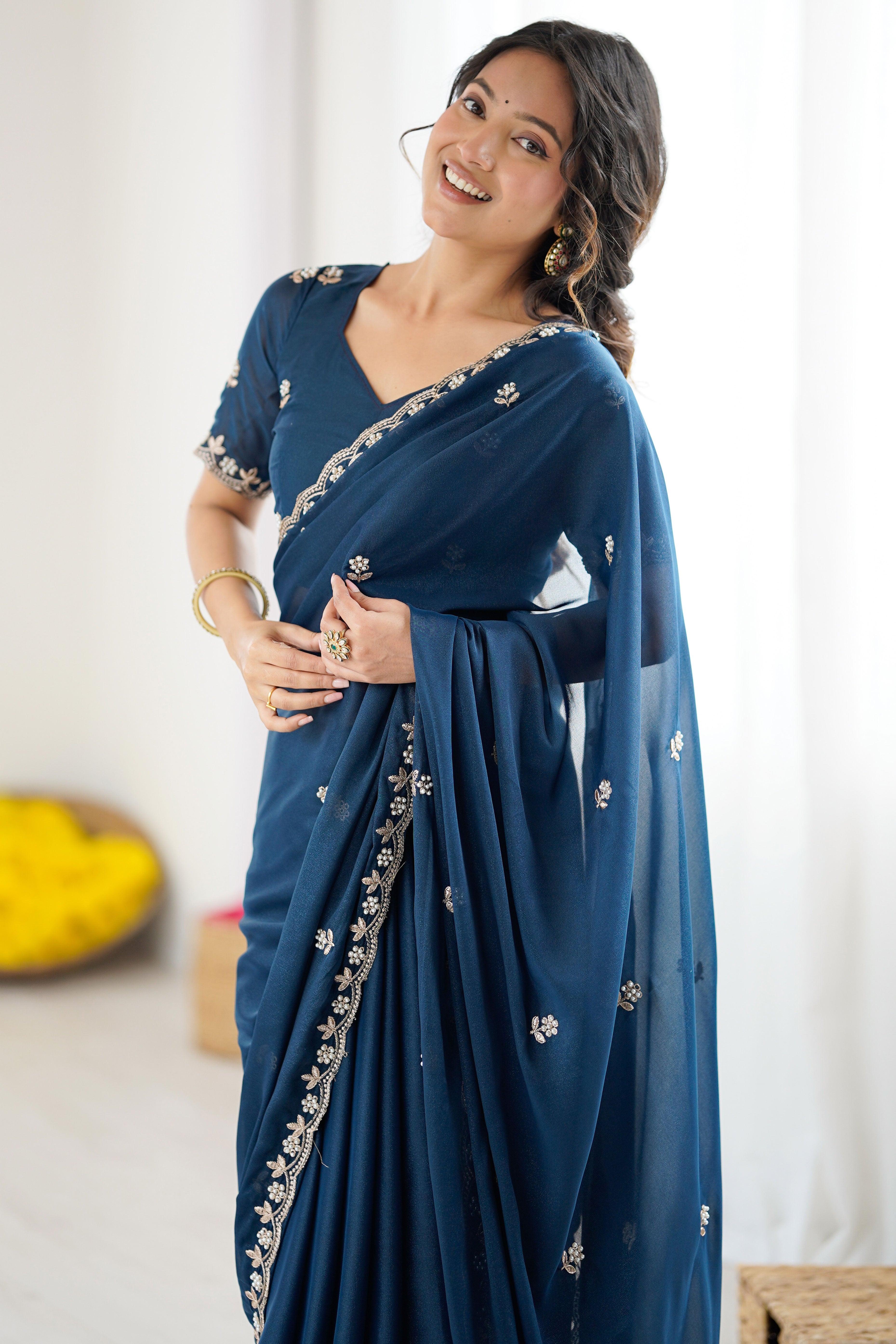 Blue Partywear Star Georgette Saree Adorned with Floral Embroidery and Beads Work