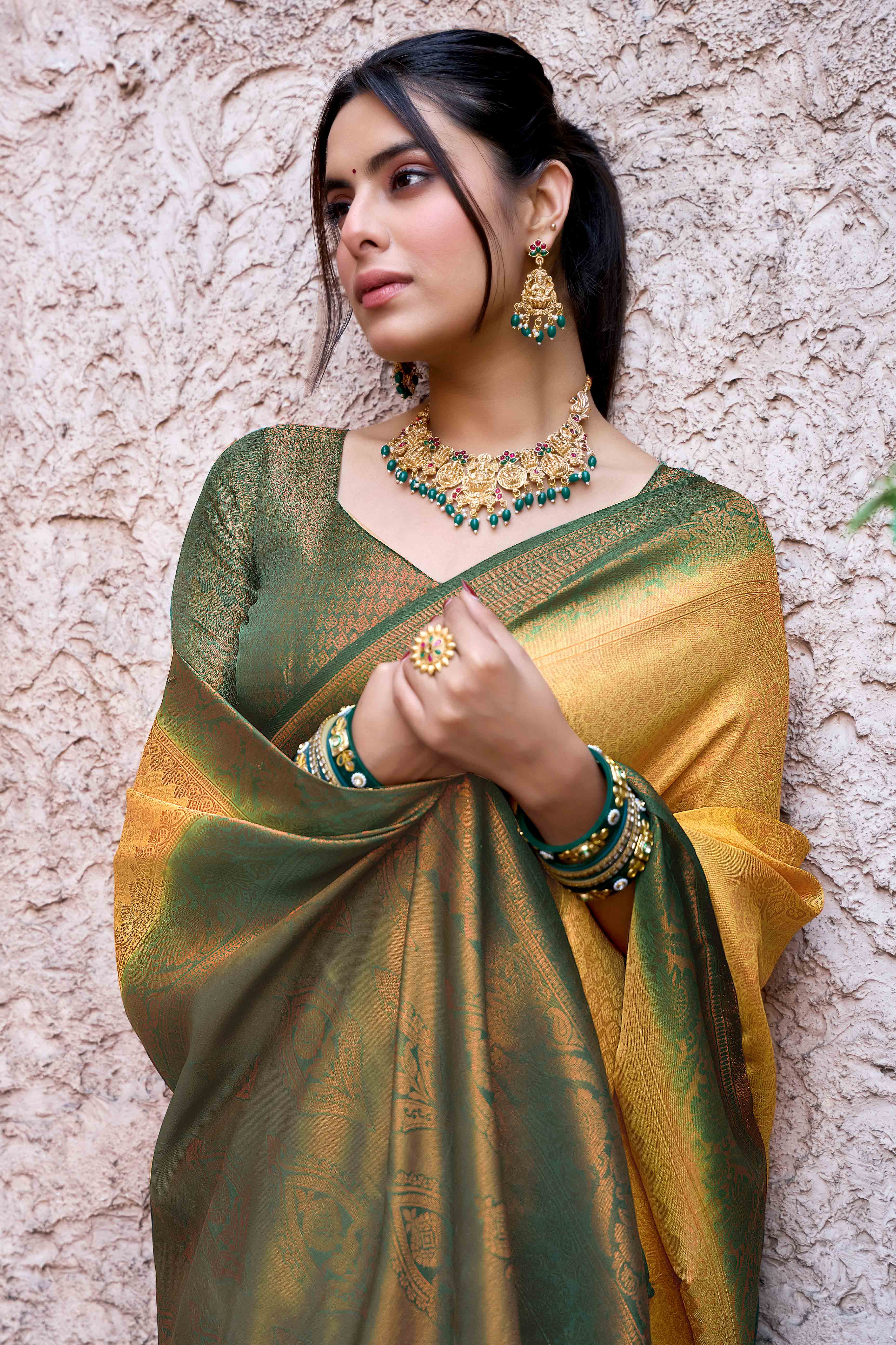 Mustard Banarasi Silk Saree Featuring Elegant Floral Woven & Delicate Tassel Edging