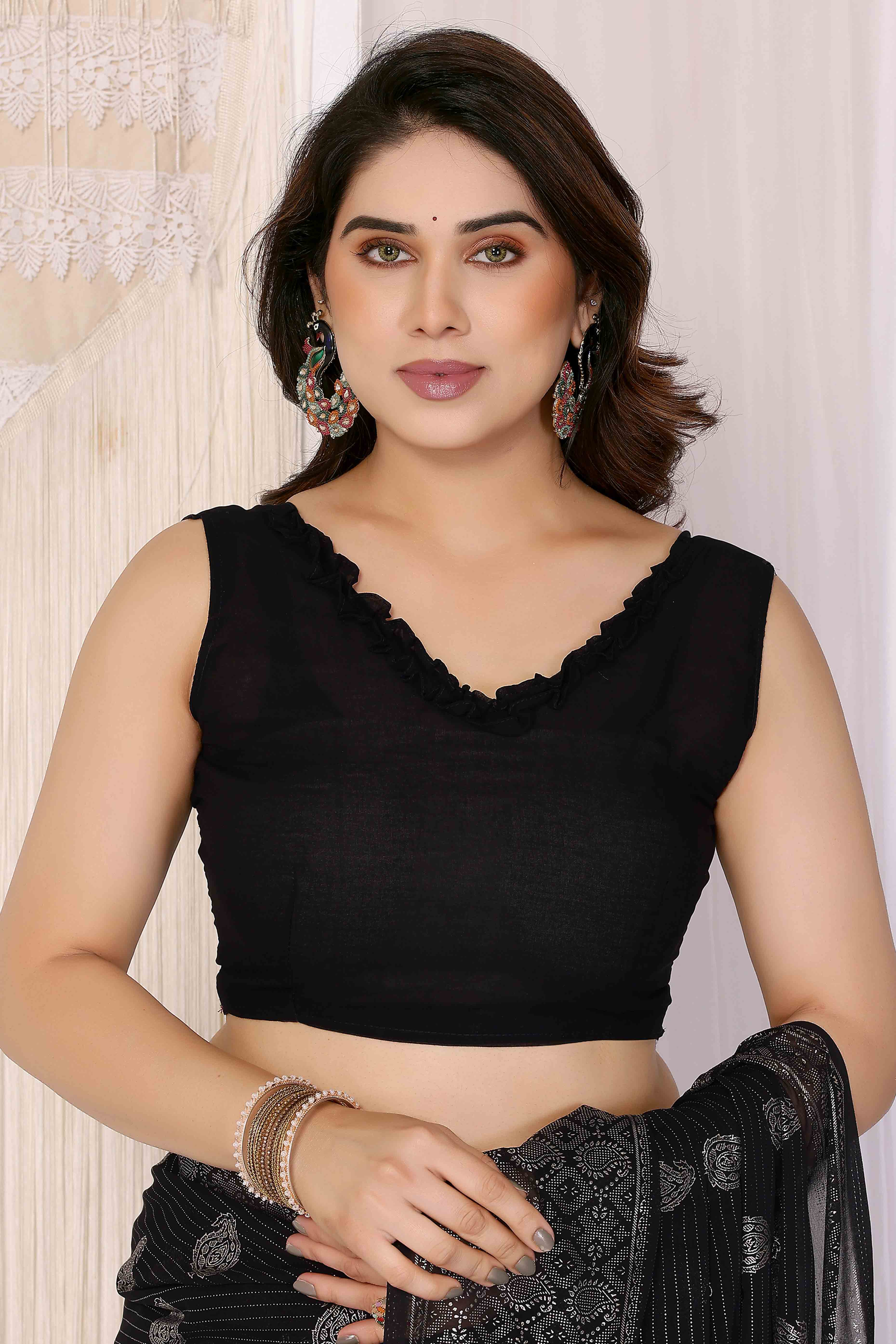 Black Foil Printed Georgette Saree Enhanced With Delicate Lace Border & Elegant Tassel