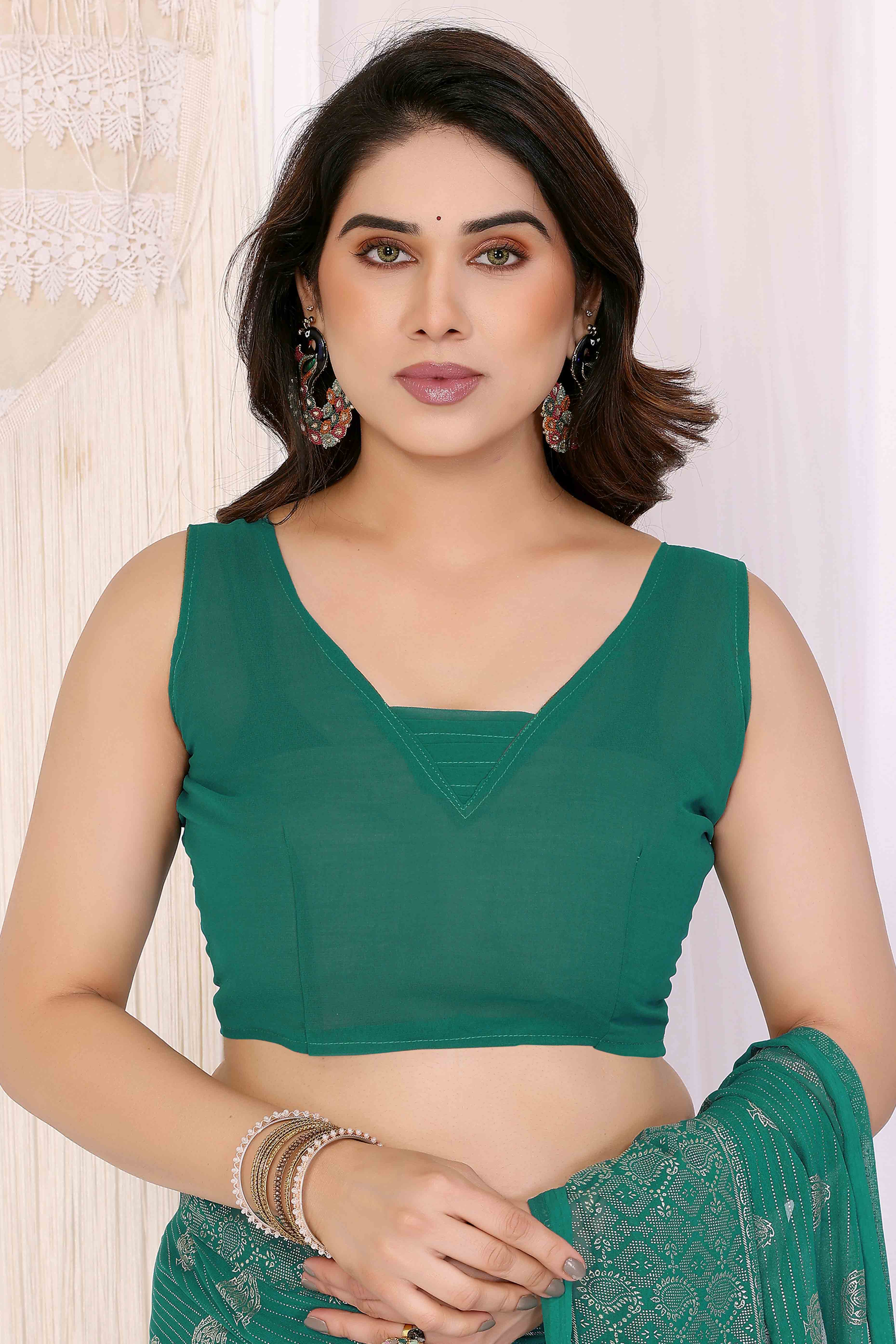 Rama Green Foil Printed Georgette Saree Enhanced With Delicate Lace Border & Elegant Tassel