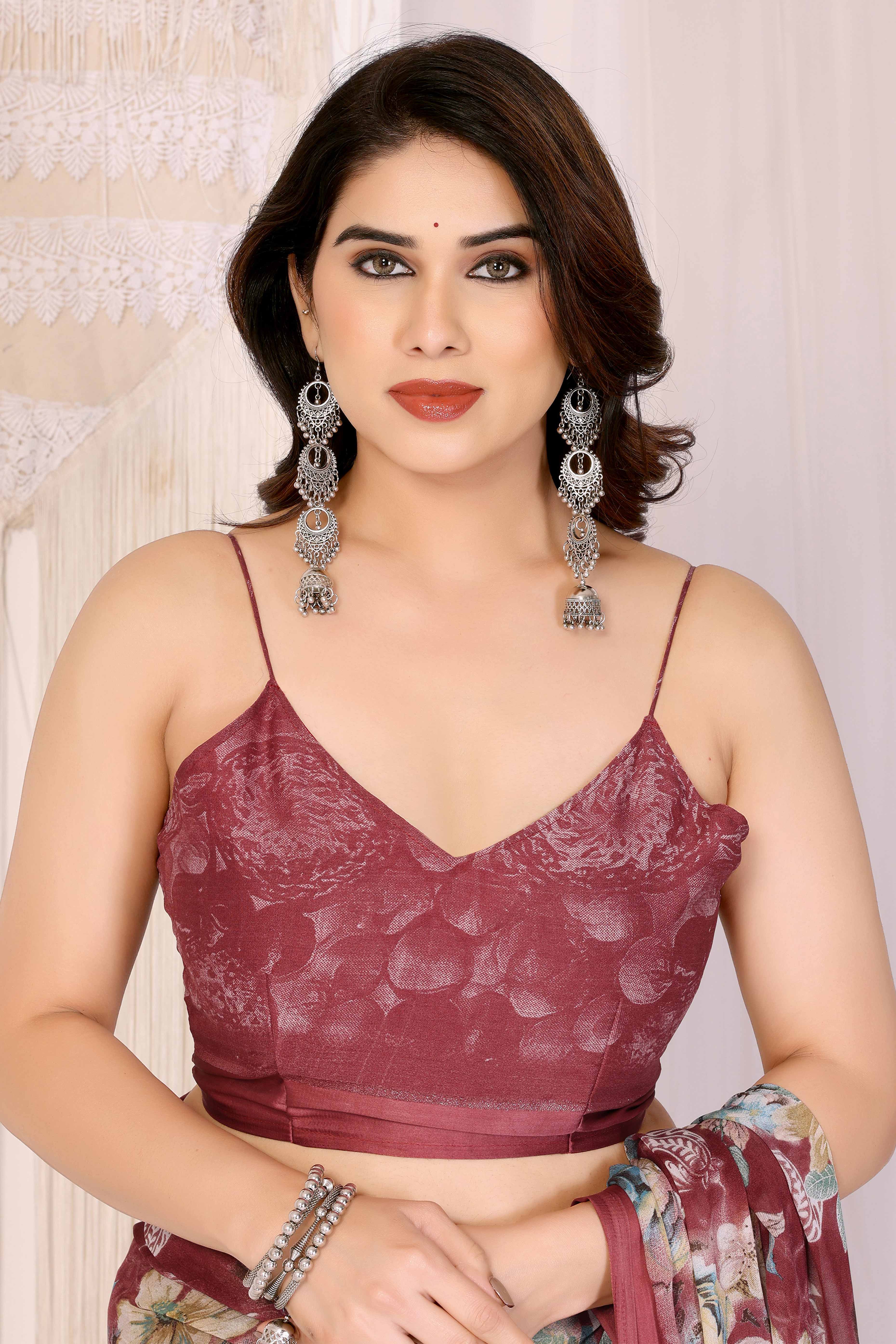 Maroon Floral Printed Crepe Saree Enhanced With A Lustrous Satin Patta Border
