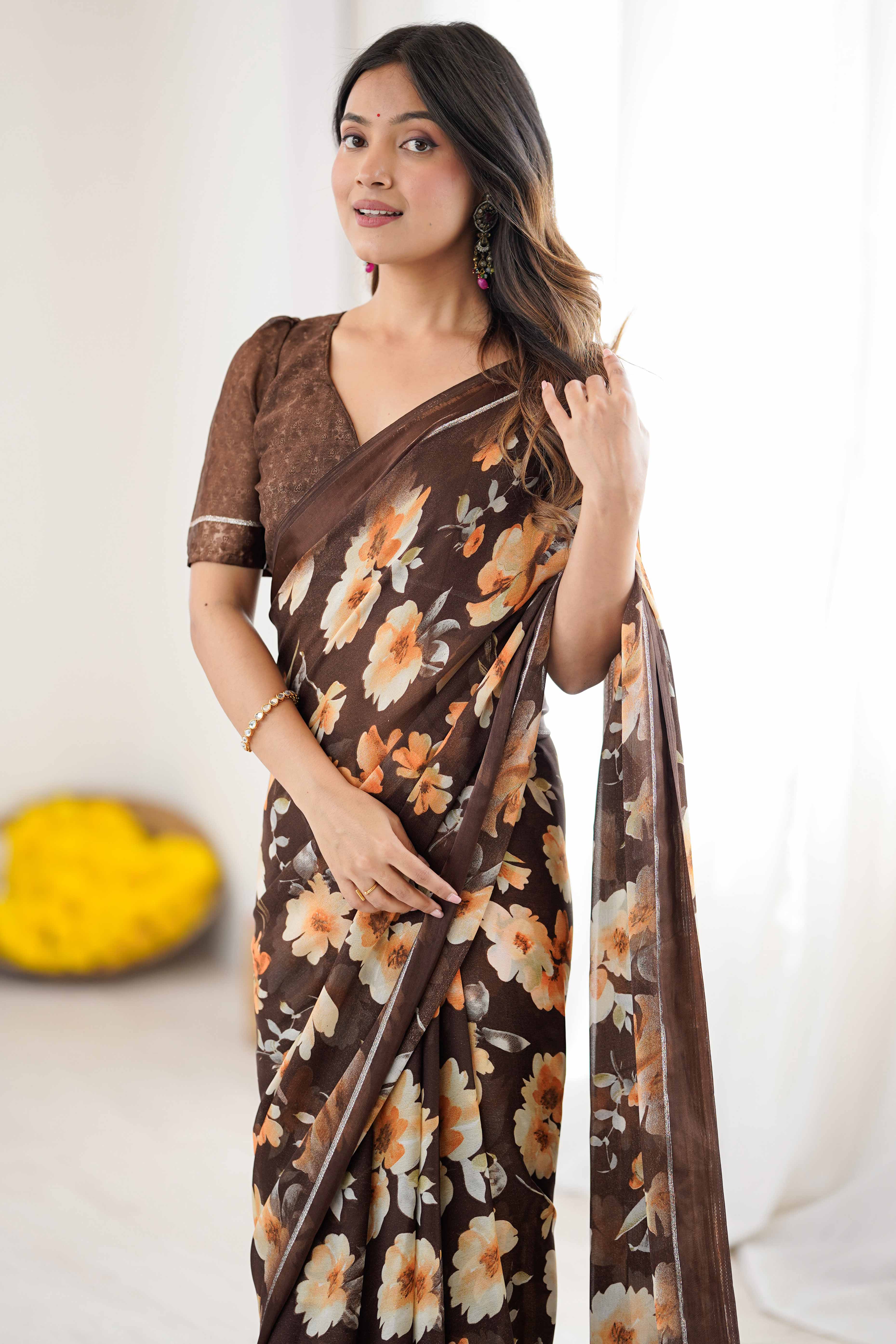 Brown Floral Printed Moss Silk Blend Saree Adorned With Playful Tassel Pallu