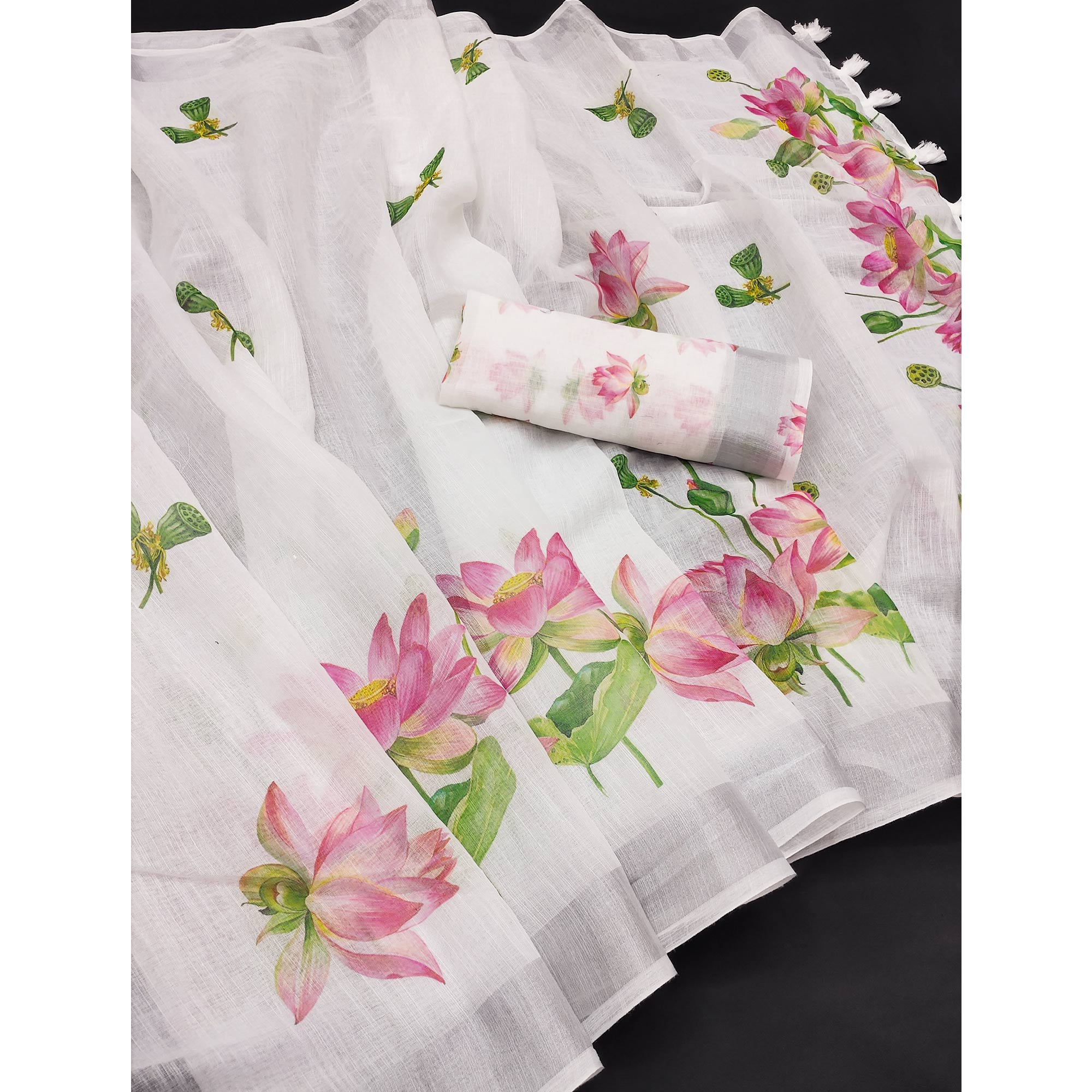 Ethereal White Linen Saree with Floral Print & Tassel Detail